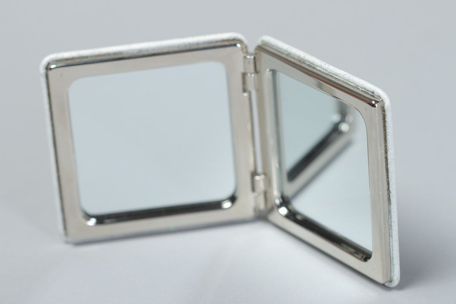 Handmade decorative white women's pocket mirror with details of clock mechanisms photo 3