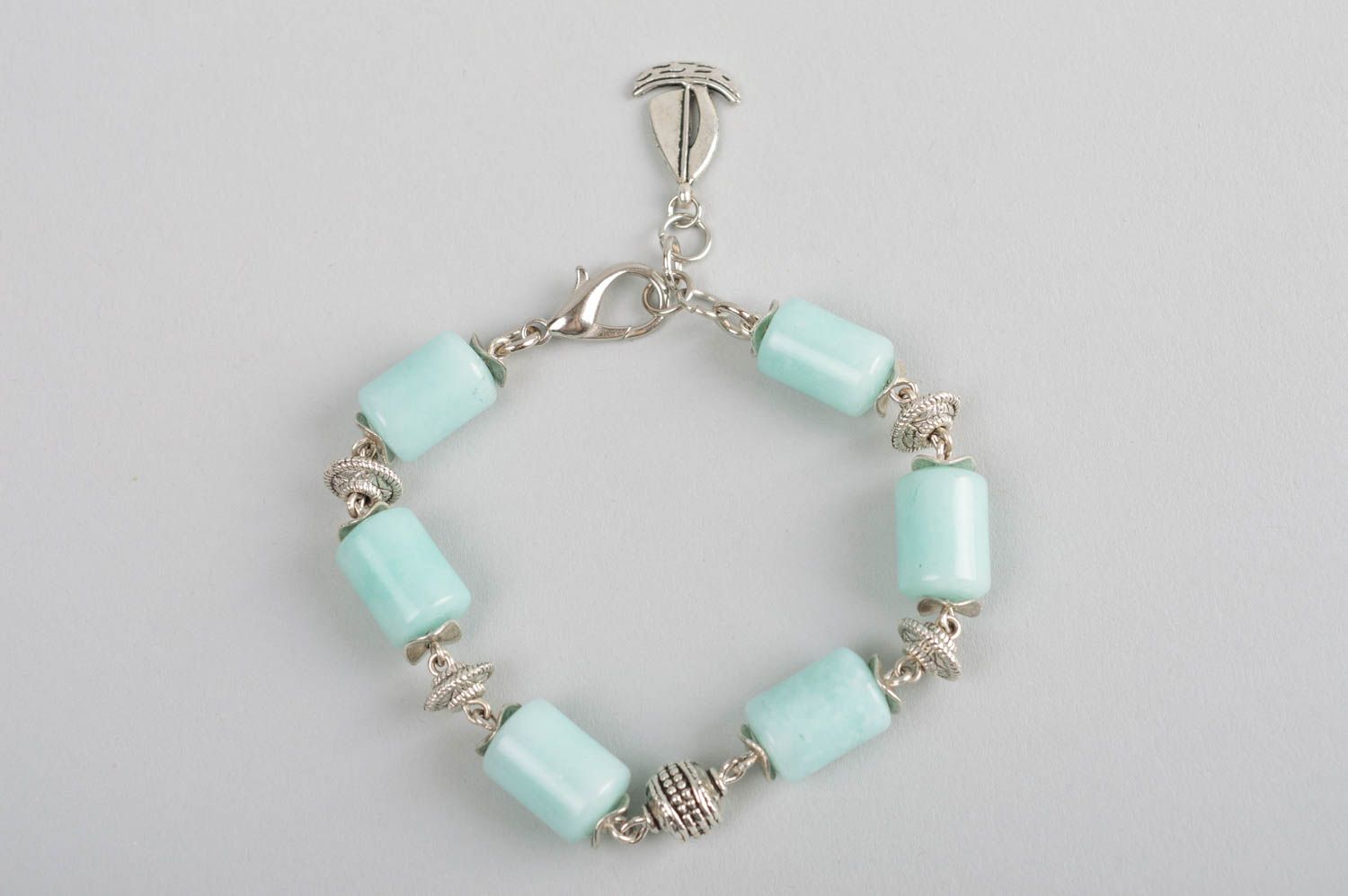 Handmade designer aquamarine gemstone bracelet with metal charms photo 2