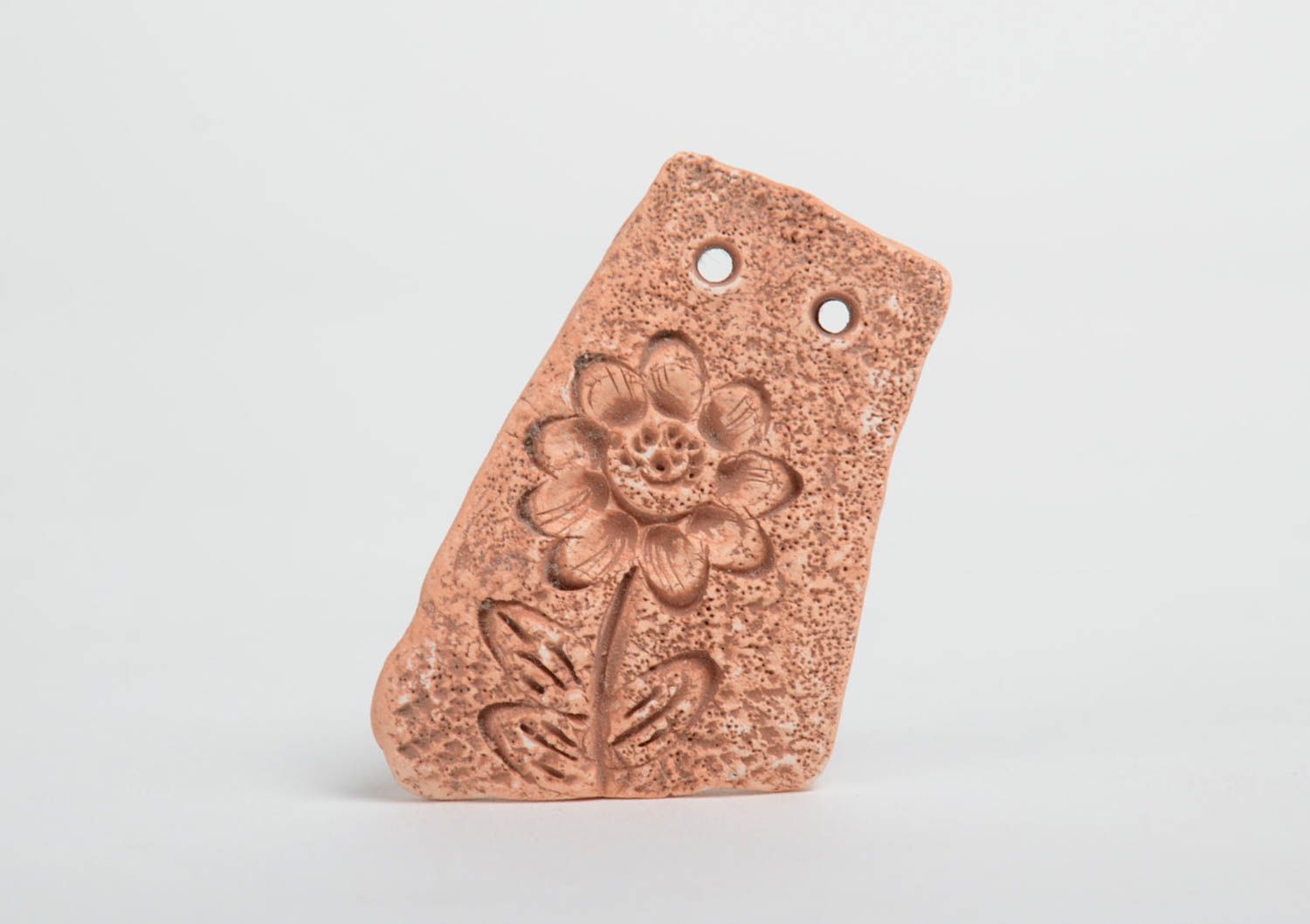 Handmade small flat ceramic pendant for painting with scratched flower pattern  photo 2