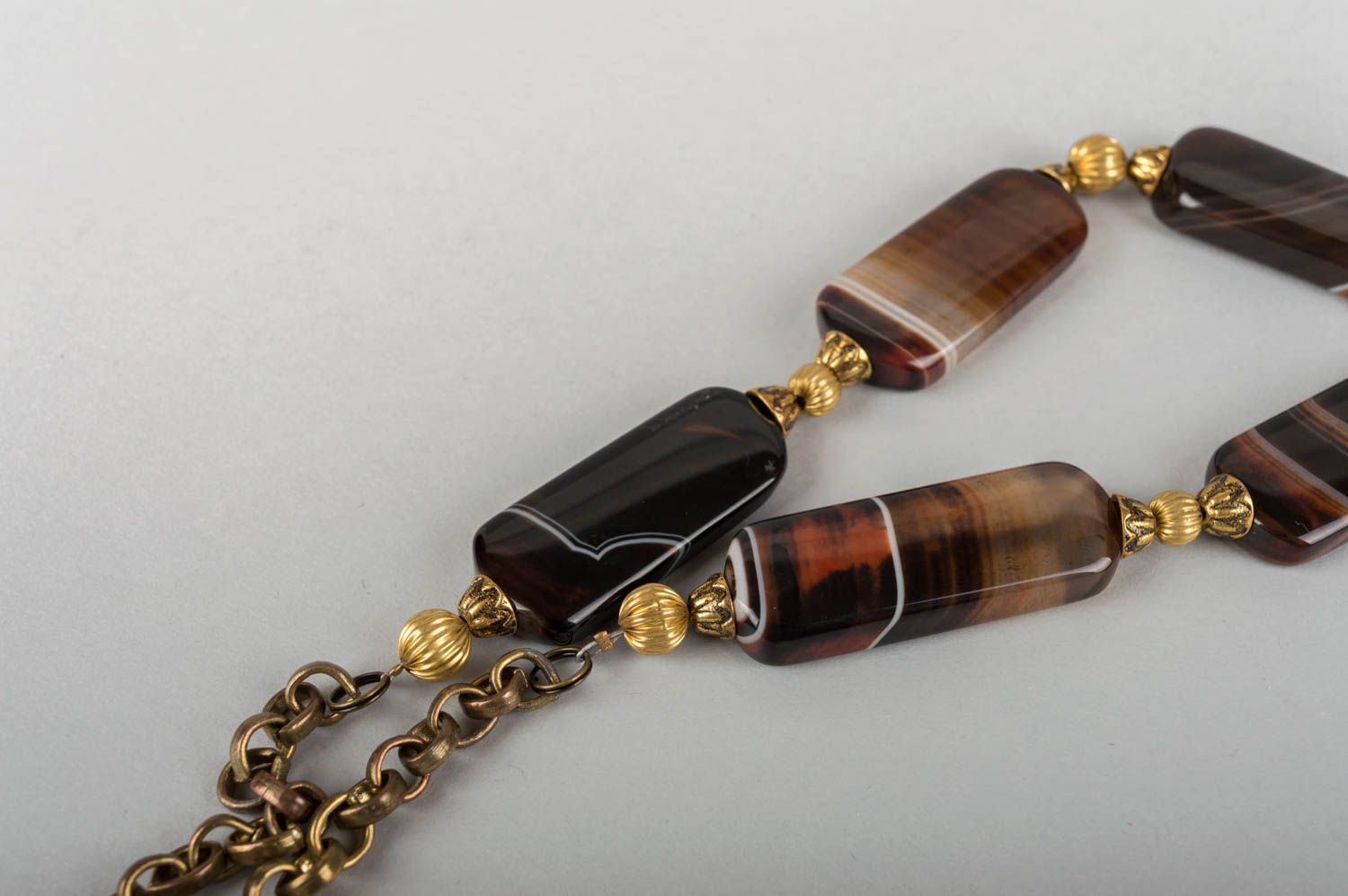 Handmade designer women's necklace with natural brown agate stone and latten  photo 5