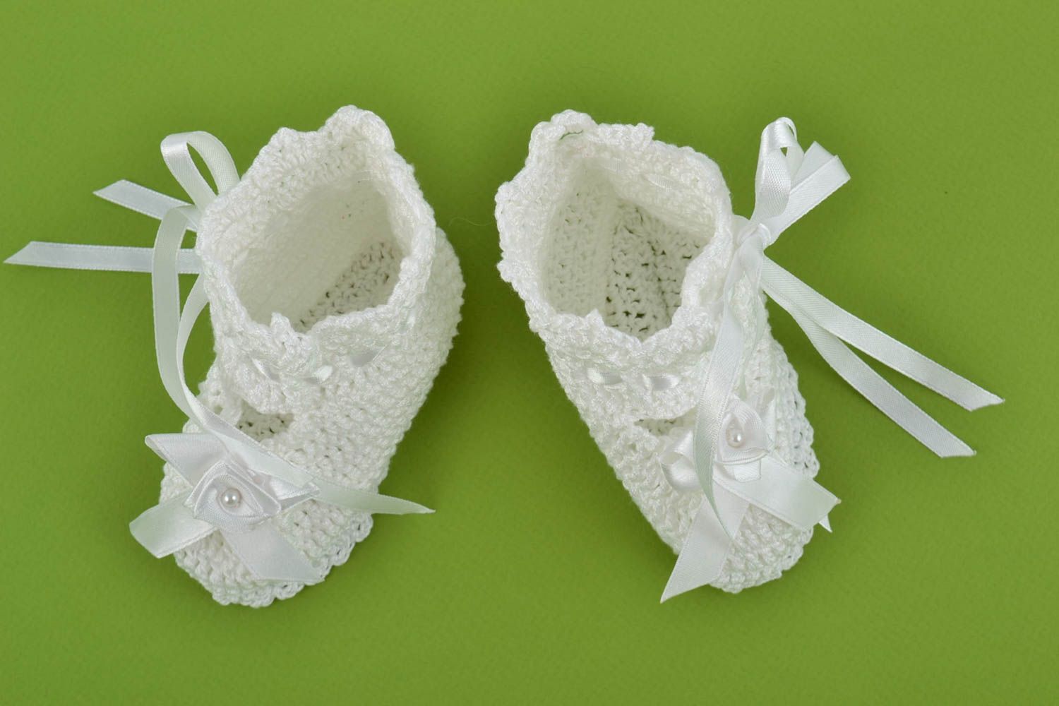 Handmade snow white lacy baby booties crocheted of cotton threads with bows photo 2
