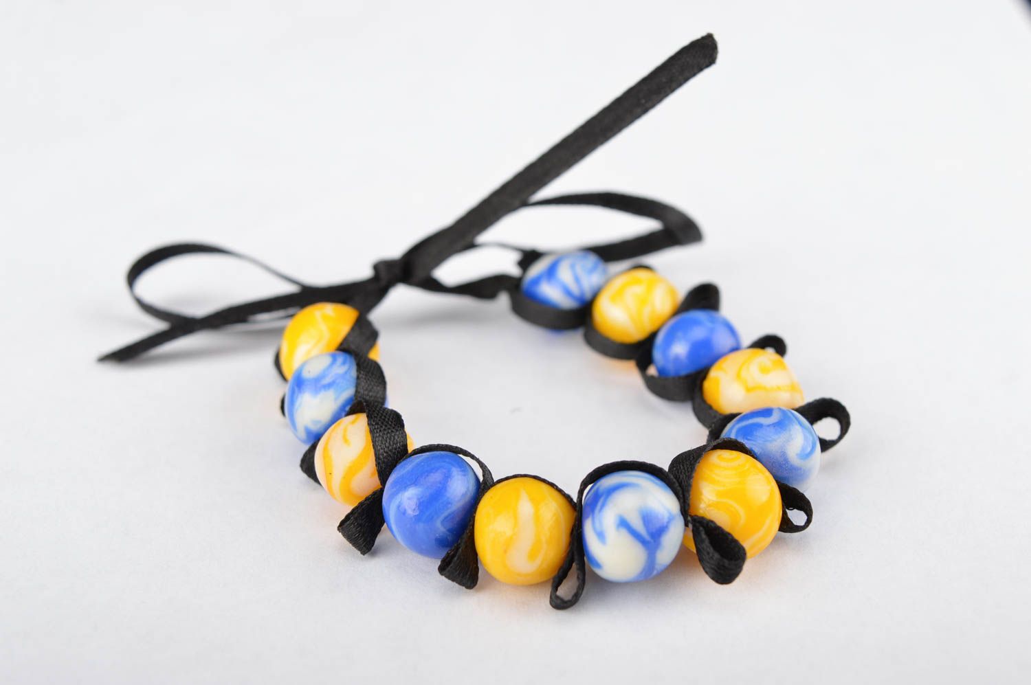 Stylish handmade yellow and blue beads bracelet on a black textile cord for her photo 5