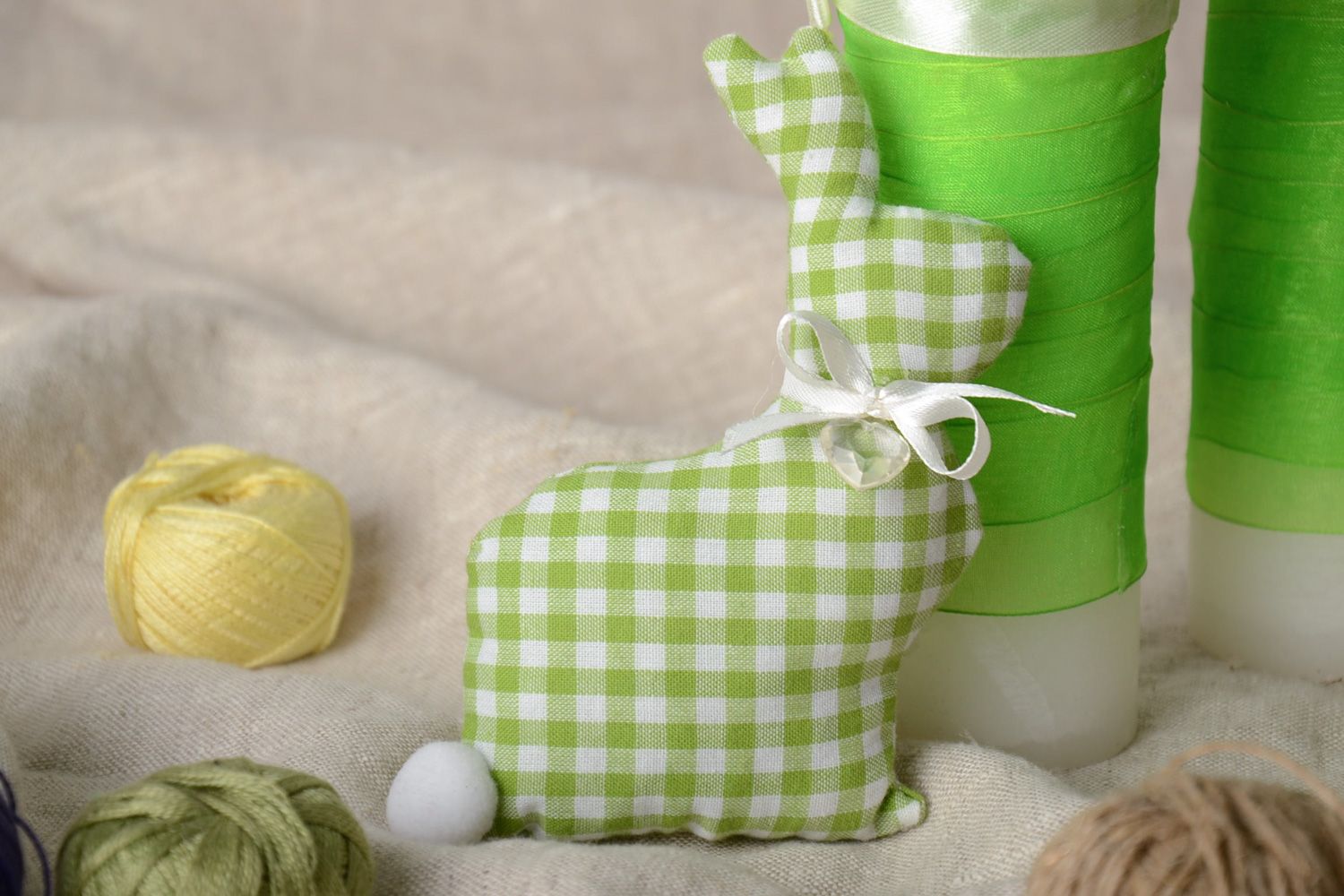 Handmade interior soft toy sewn of checkered green fabric in the shape of rabbit  photo 1