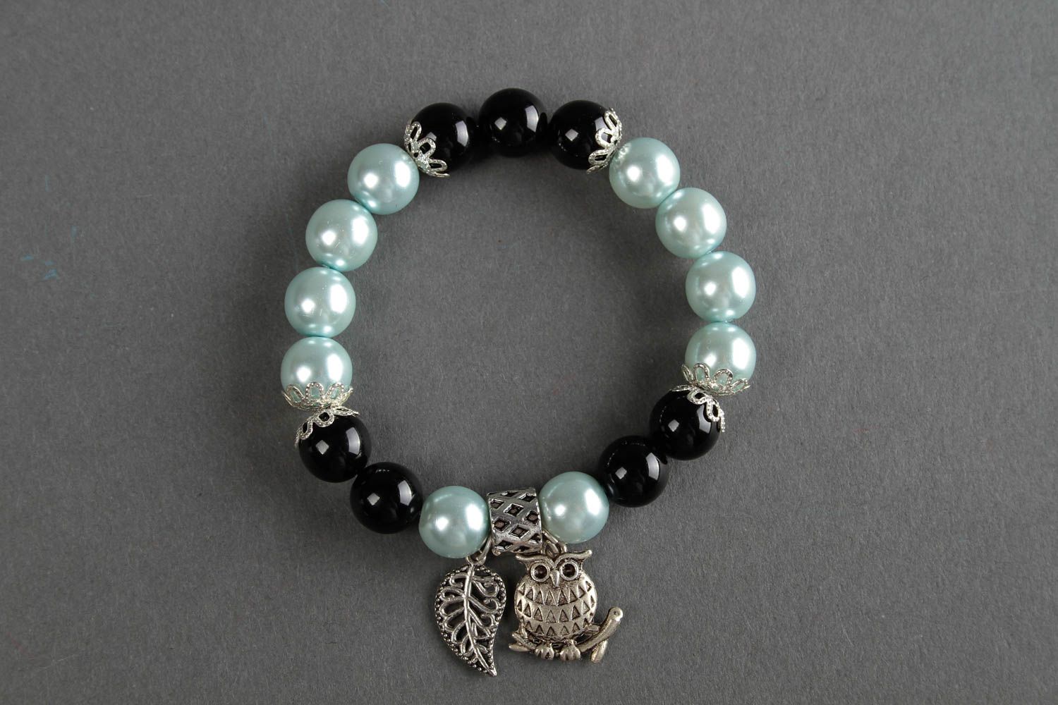 Handmade black and silver color beads bracelet with owl charm for young girls photo 1