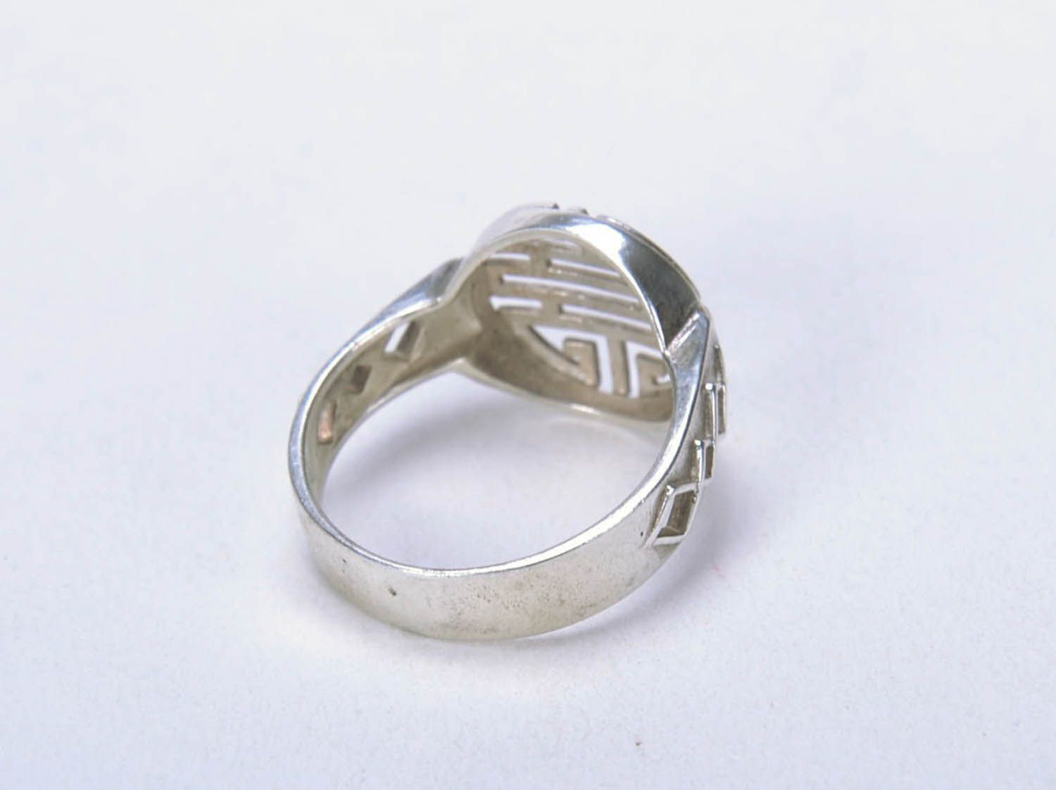 Silver ring with ethnic pattern photo 2