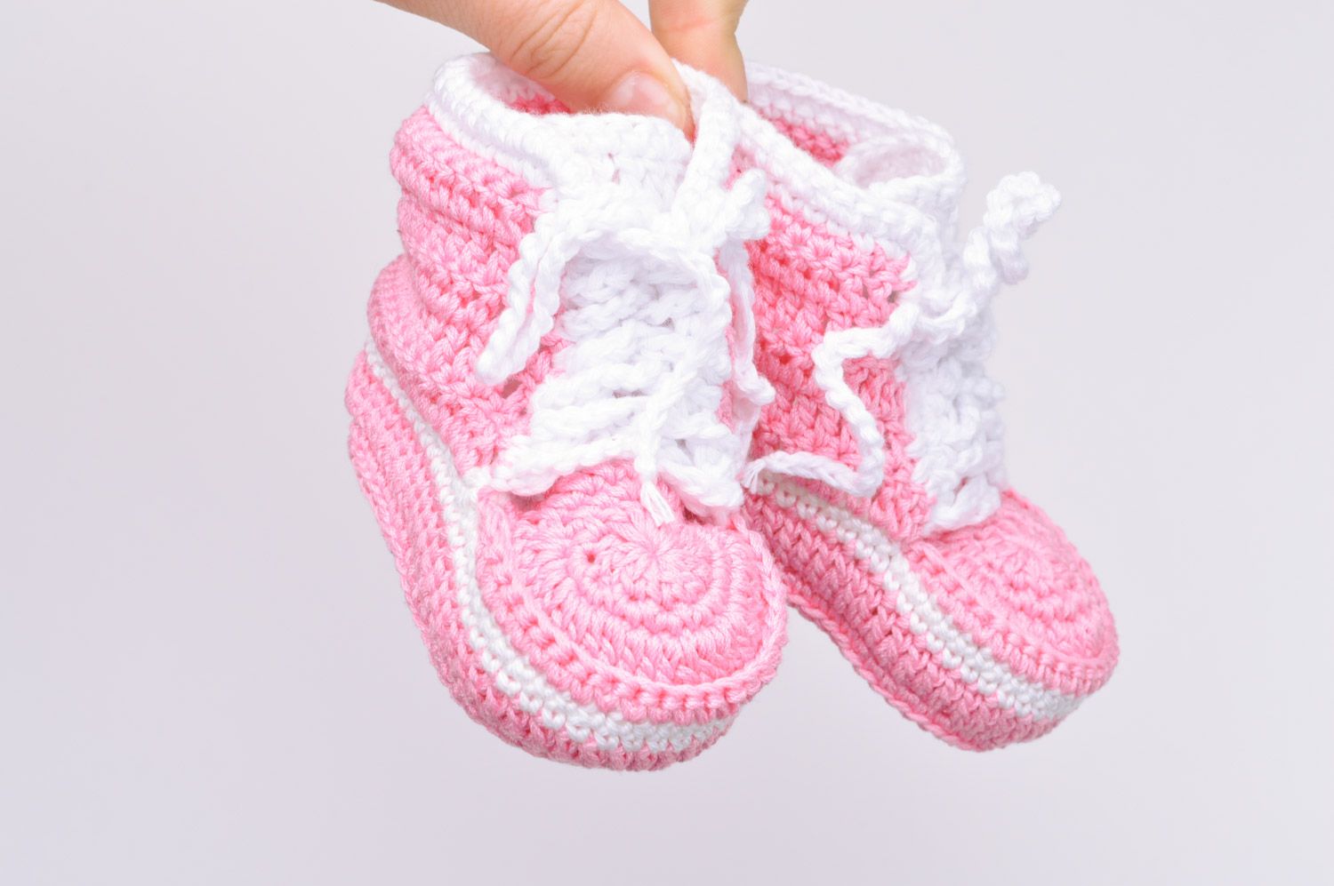 Handmade crocheted pink booties made of cotton in the form of sneakers for girls photo 3