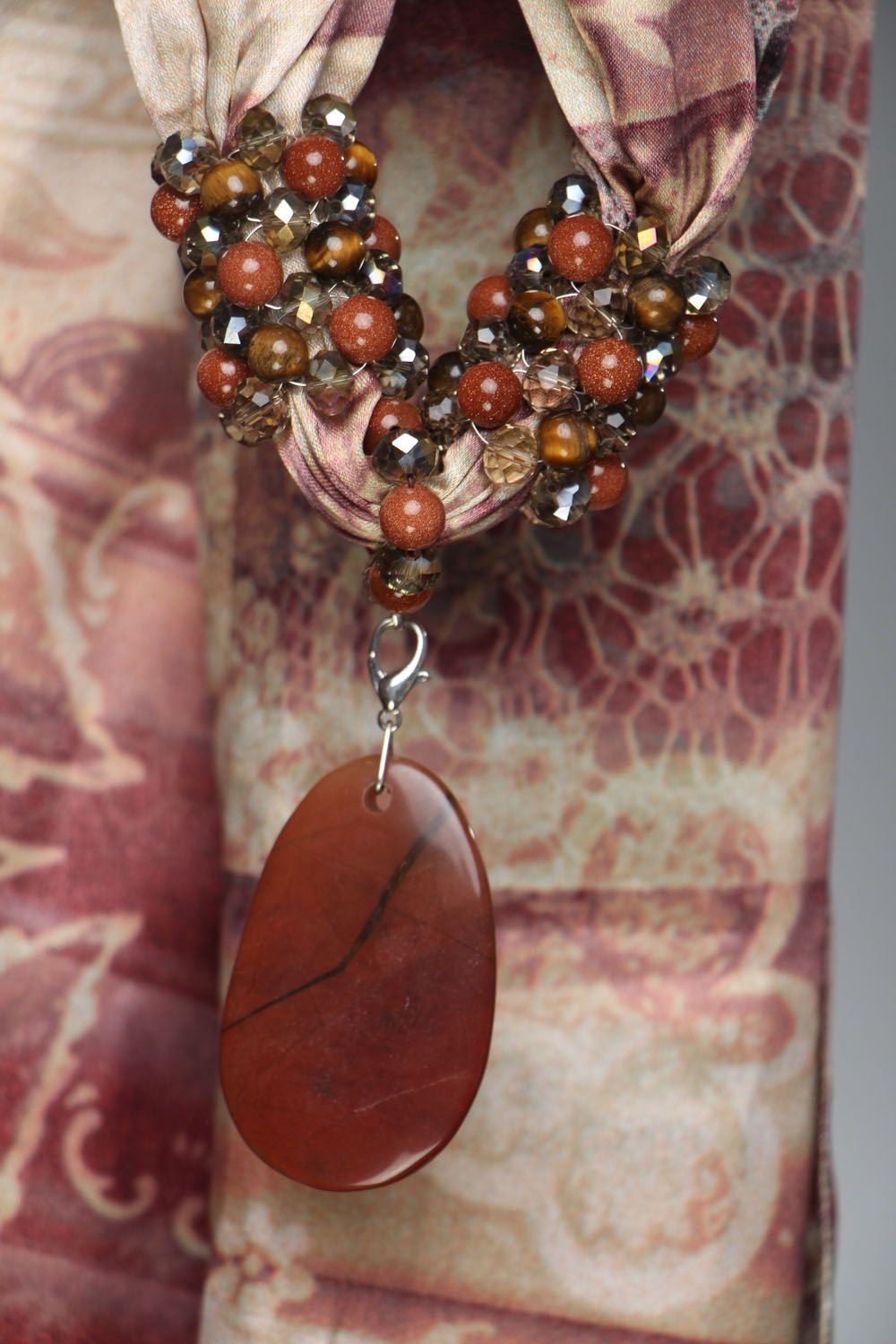 Thin scarf with natural stones photo 1
