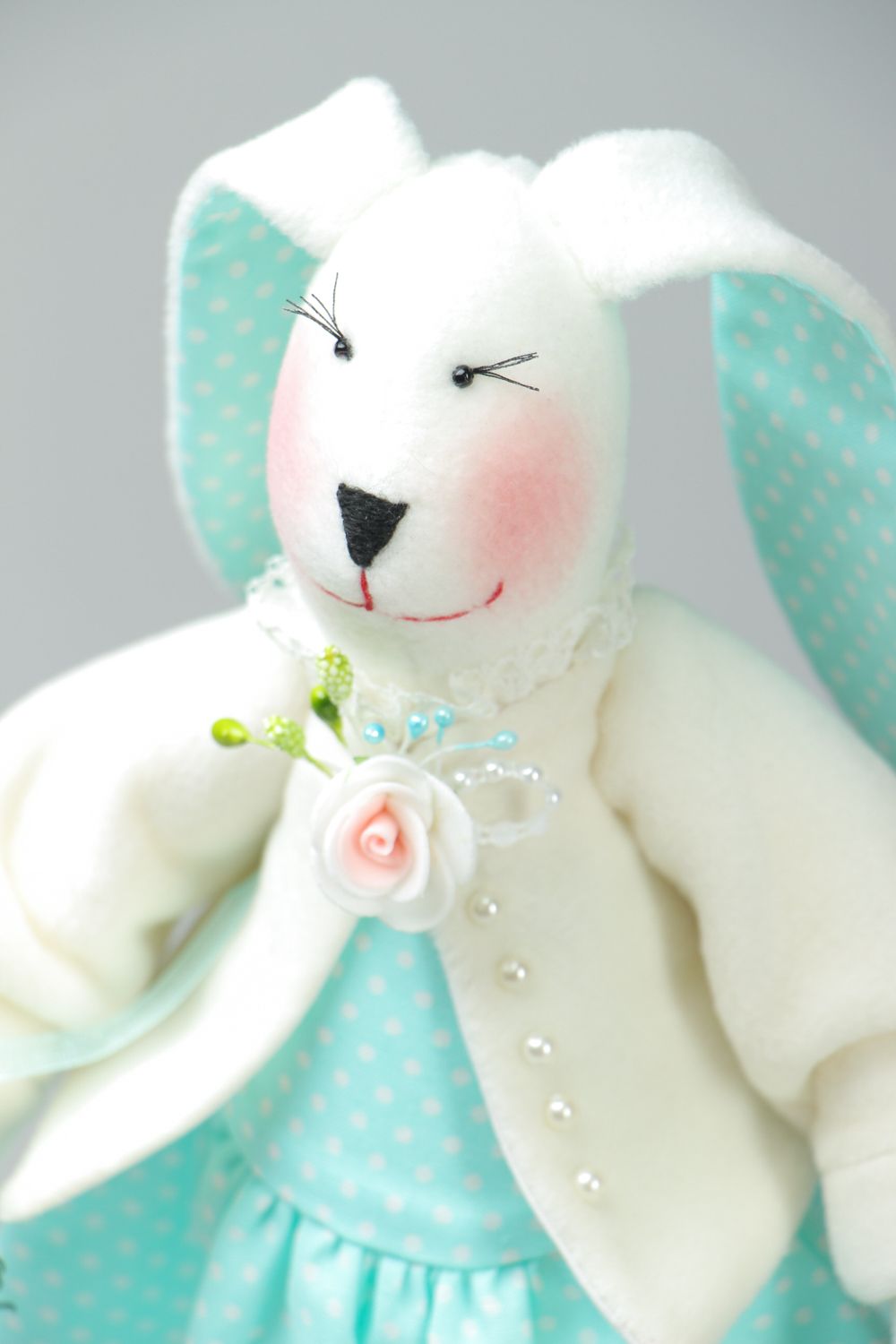 Beautiful toy rabbit with long ears photo 2