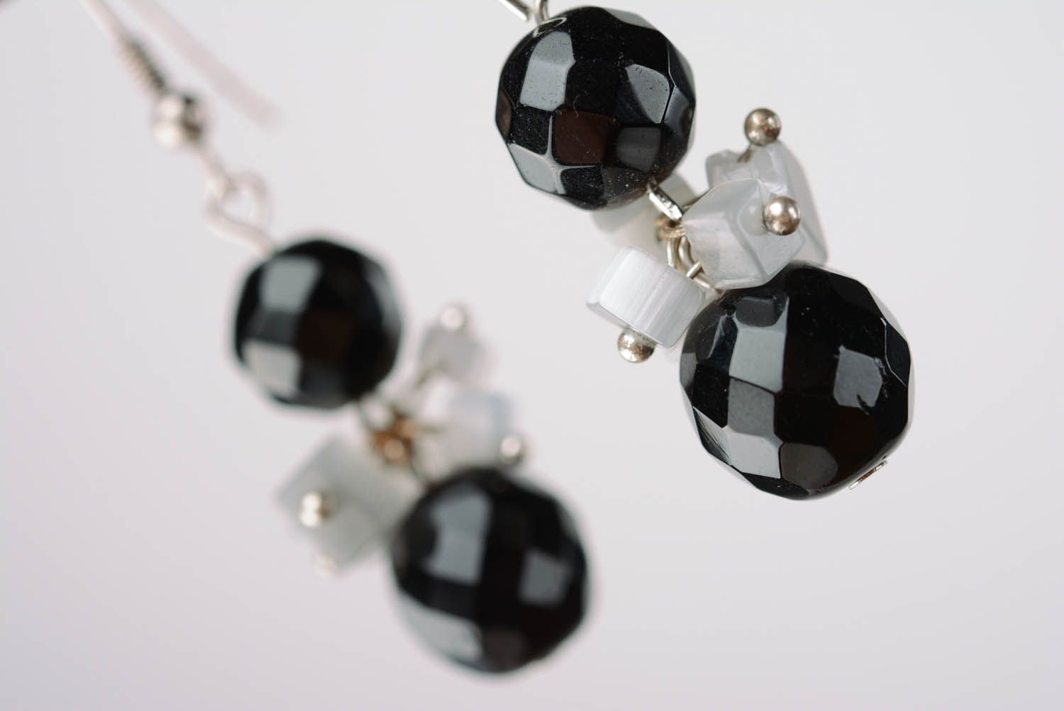 Metal earrings with black crystal photo 5