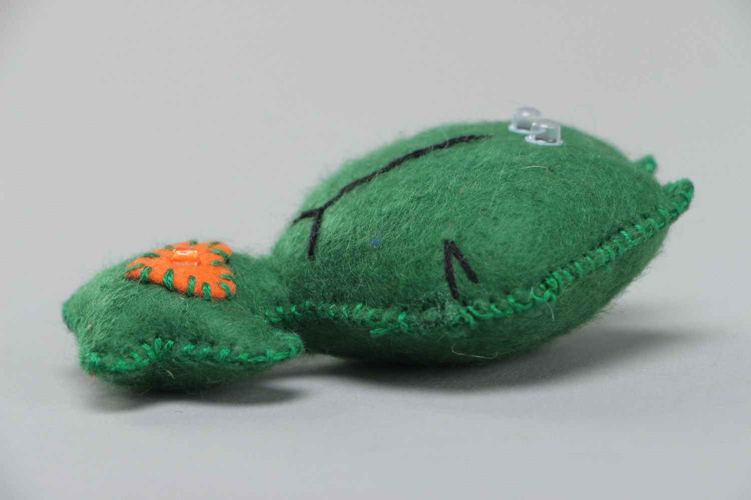 Small handmade soft toy sewn of felt funny green kitten with applique work photo 3
