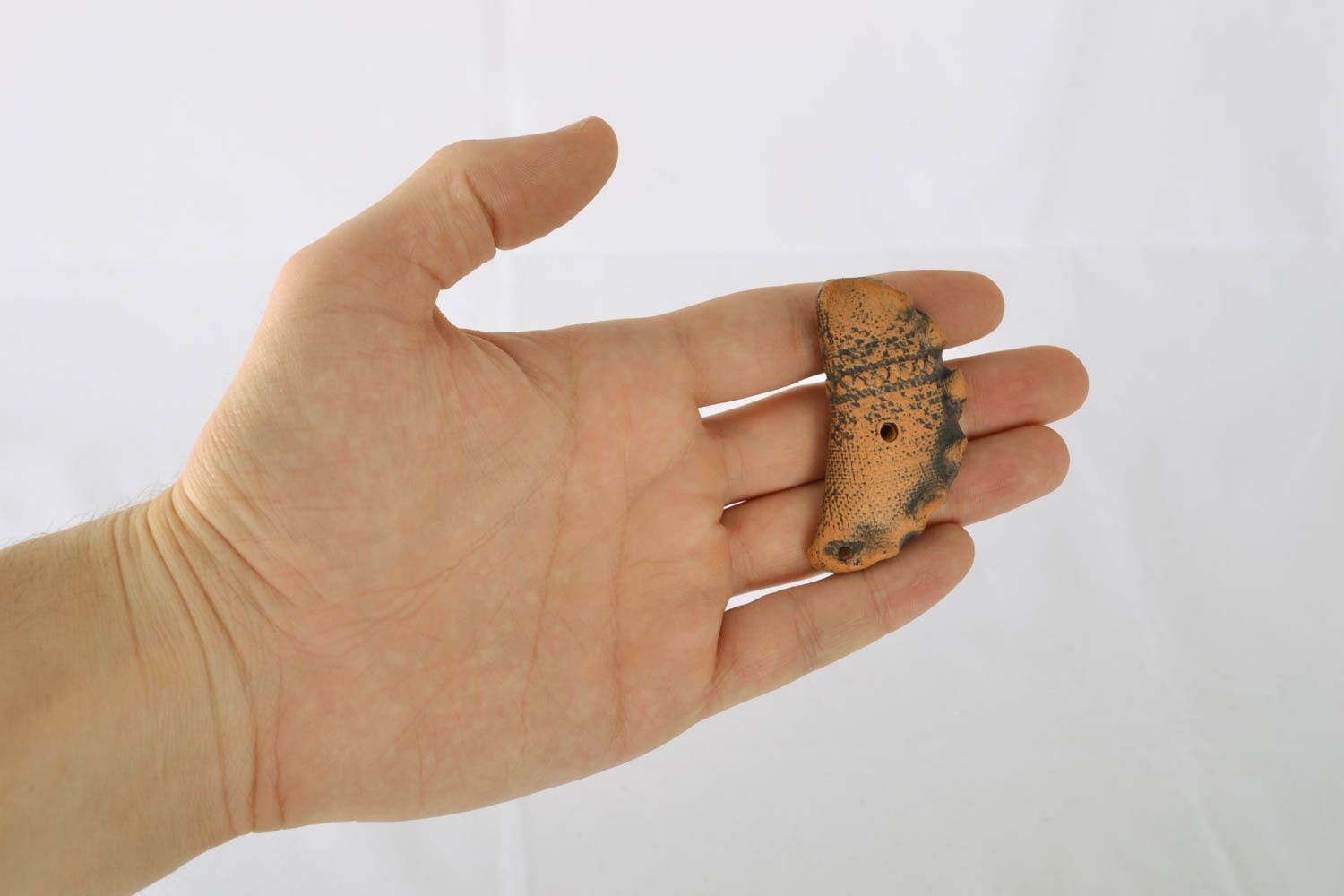 Глиняная свистулька игрушка в виде вареника фото 4