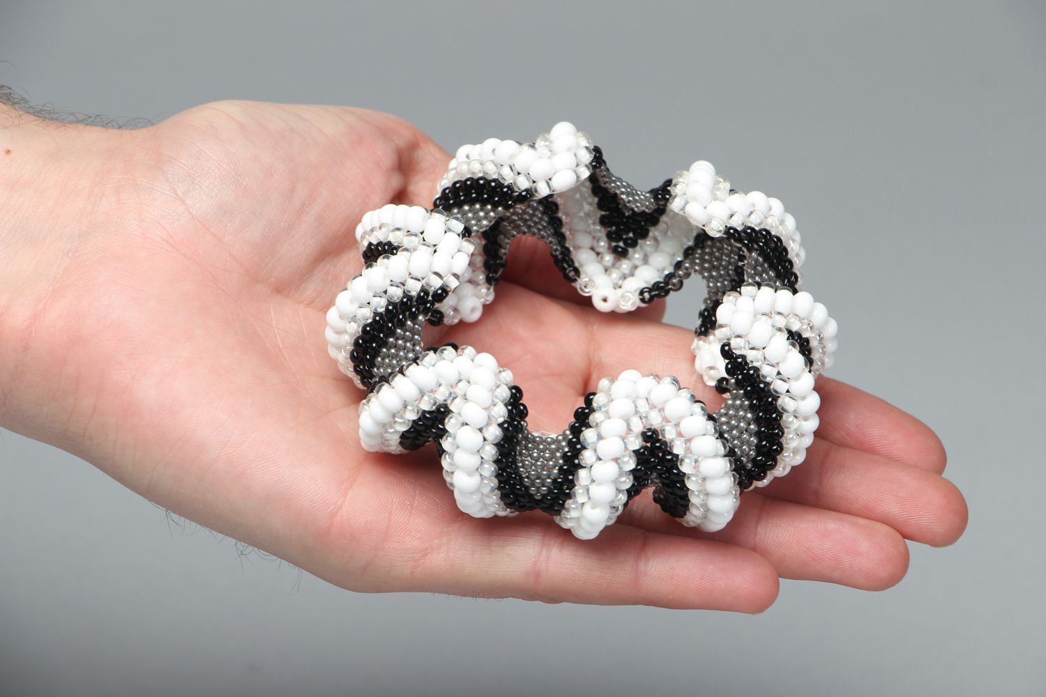 Handmade black and white beads bracelet on elastic cord photo 3