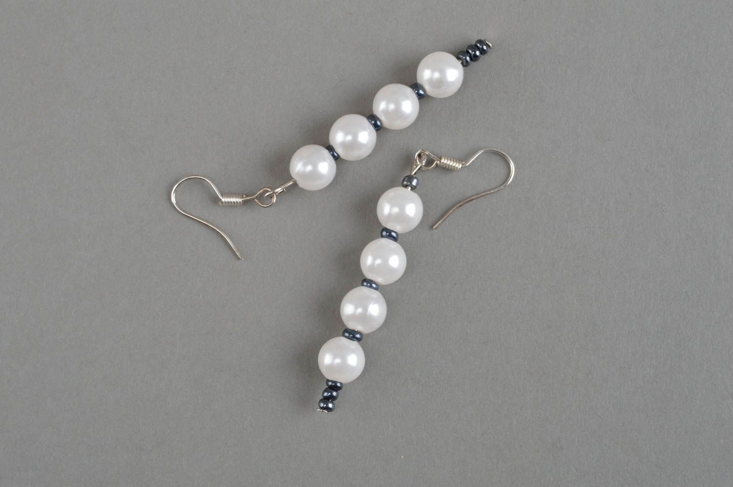 Handmade white earrings beaded woven jewelry stylish designer accessories photo 2