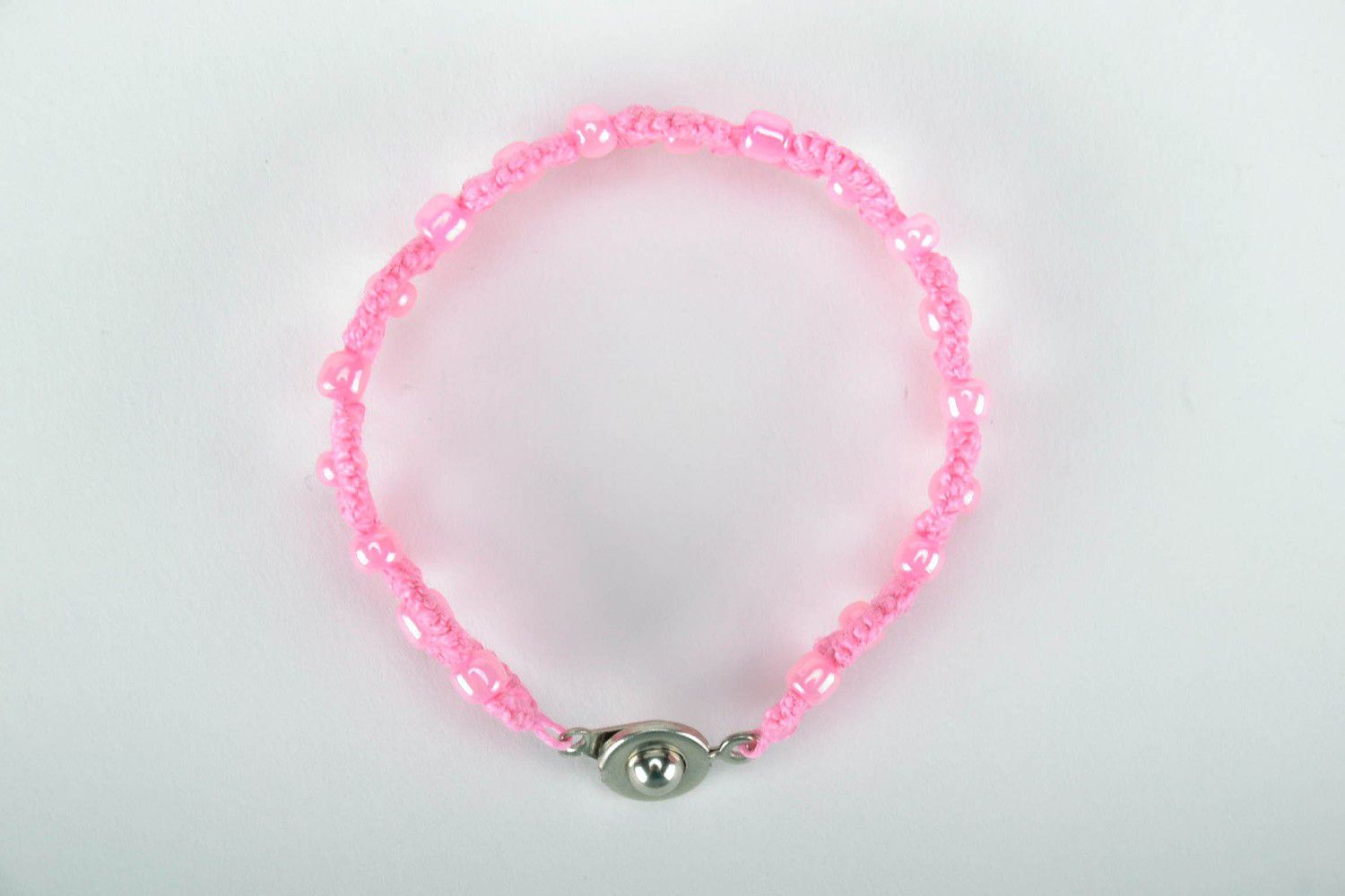 Bracelet braided from thread pink photo 2