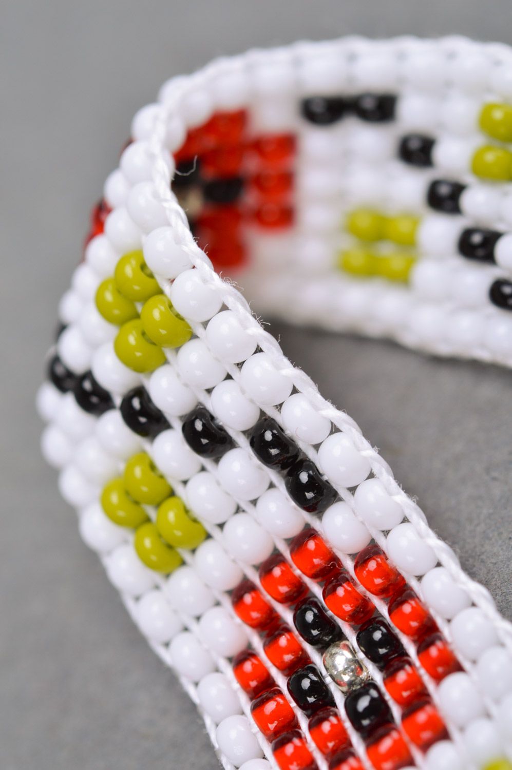 Handmade ethnic wrist bracelet woven of beads in white and red colors for women photo 4