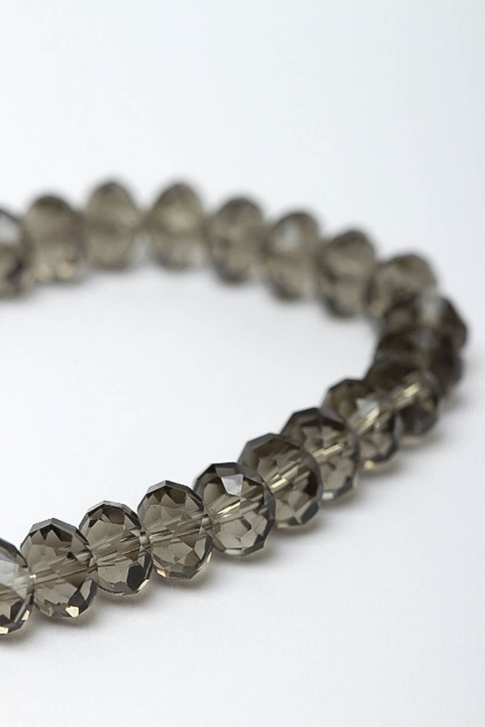 Handmade transparent light glass beads bracelet on an elastic string photo 3