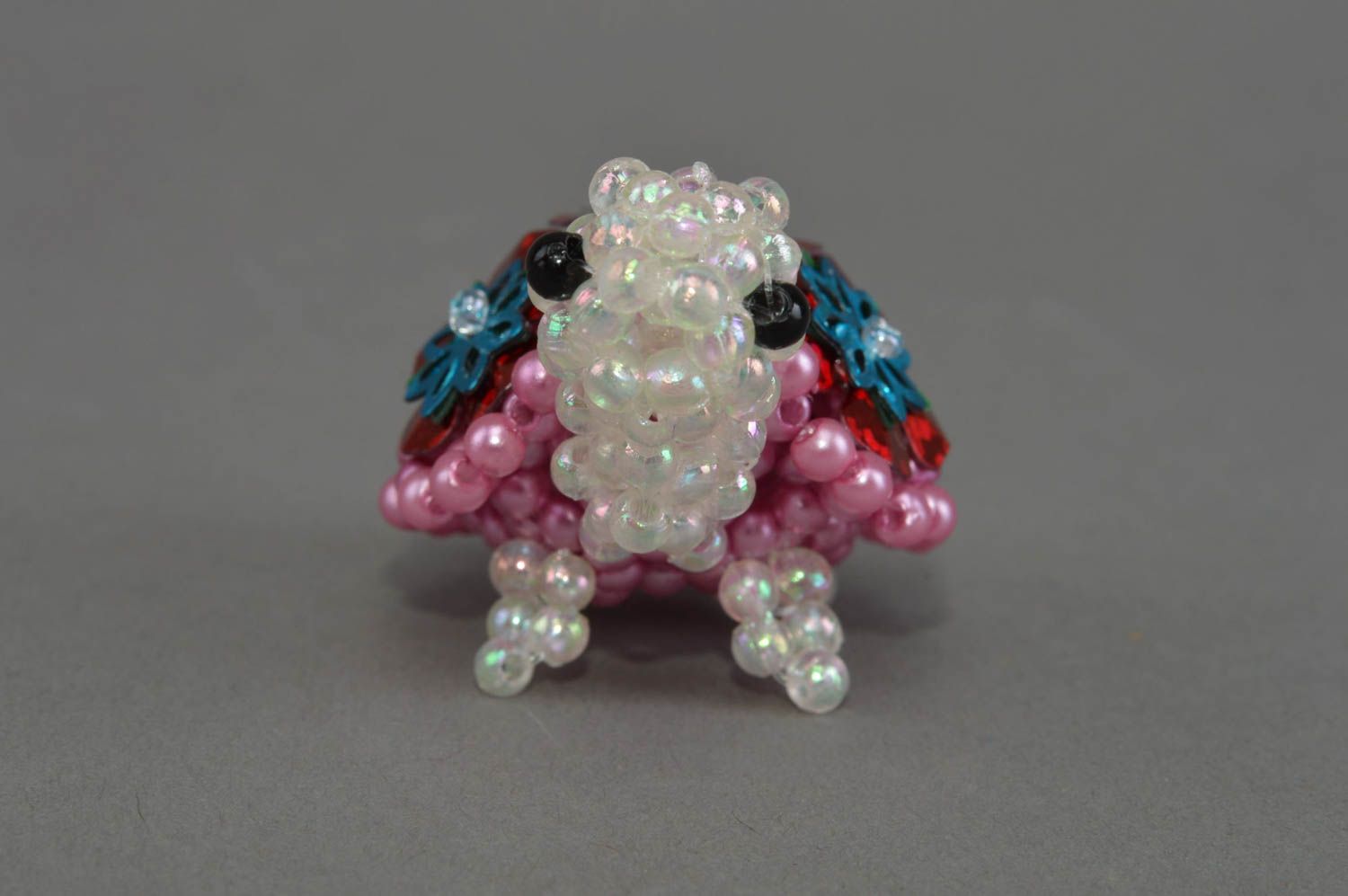 Handmade small animal figurine woven of beads statuette of turtle white and pink photo 4