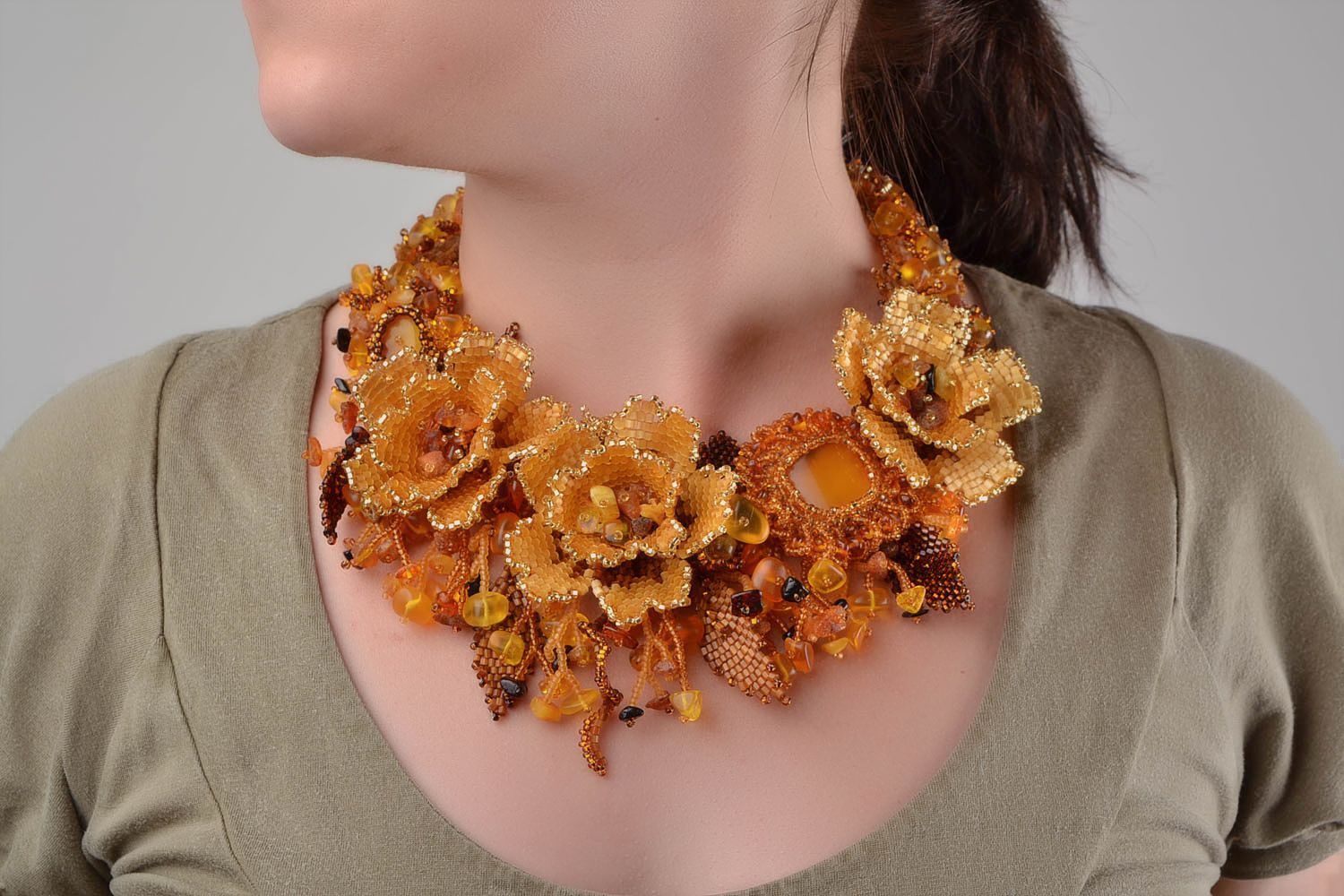 Handmade fall necklace made of beads and natural stones of amber color photo 1