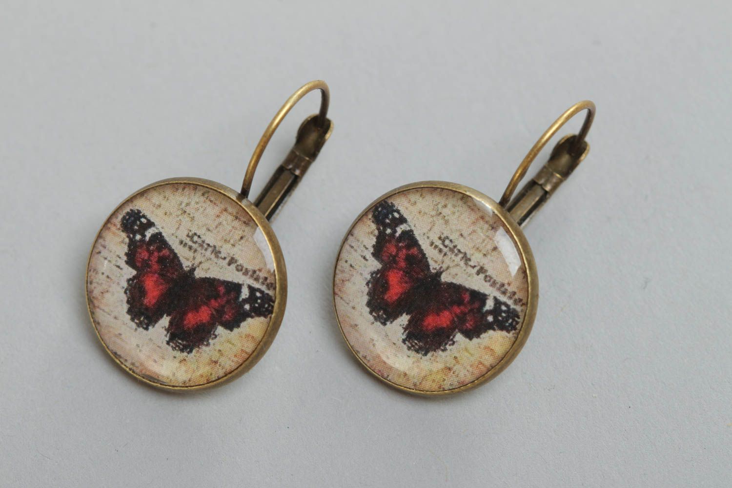 Handmade stylish beautiful earrings made of glassy glaze round with butterfly print photo 2