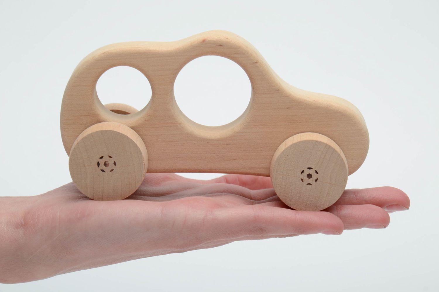 Wooden wheeled toy car photo 5