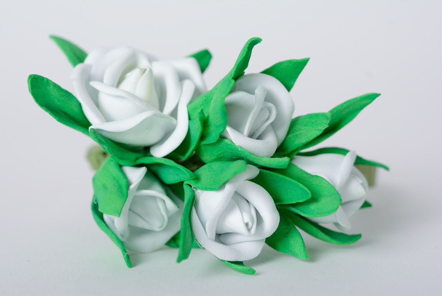 Handmade gentle foamiran fabric wrist bracelet with white flowers on green basis photo 2