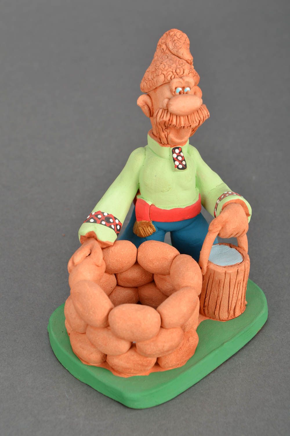 Painted ceramic statuette Cossack at the Water Well photo 3