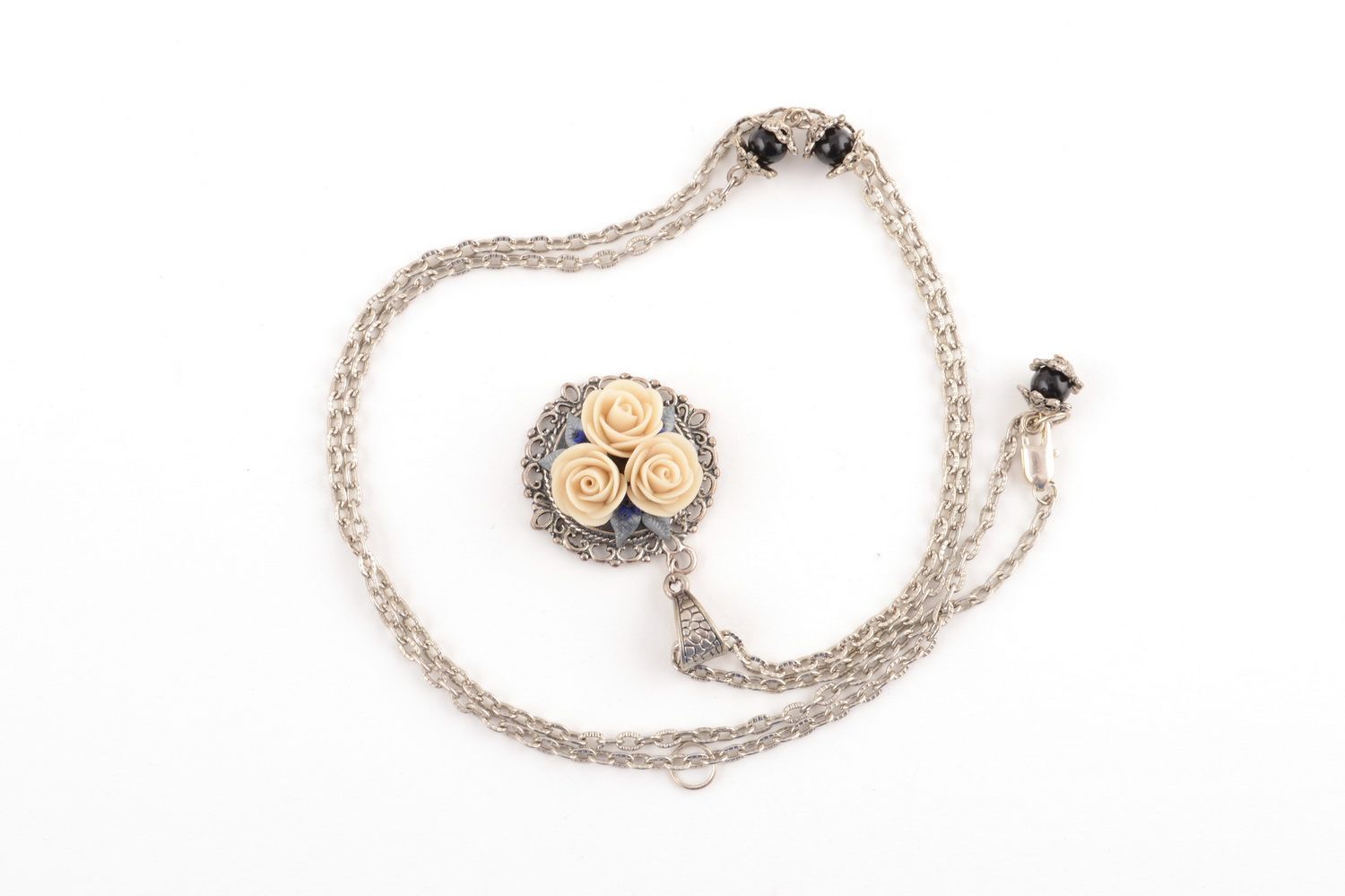 Handmade metal round pendant on chain with polymer clay cream colored flowers photo 3