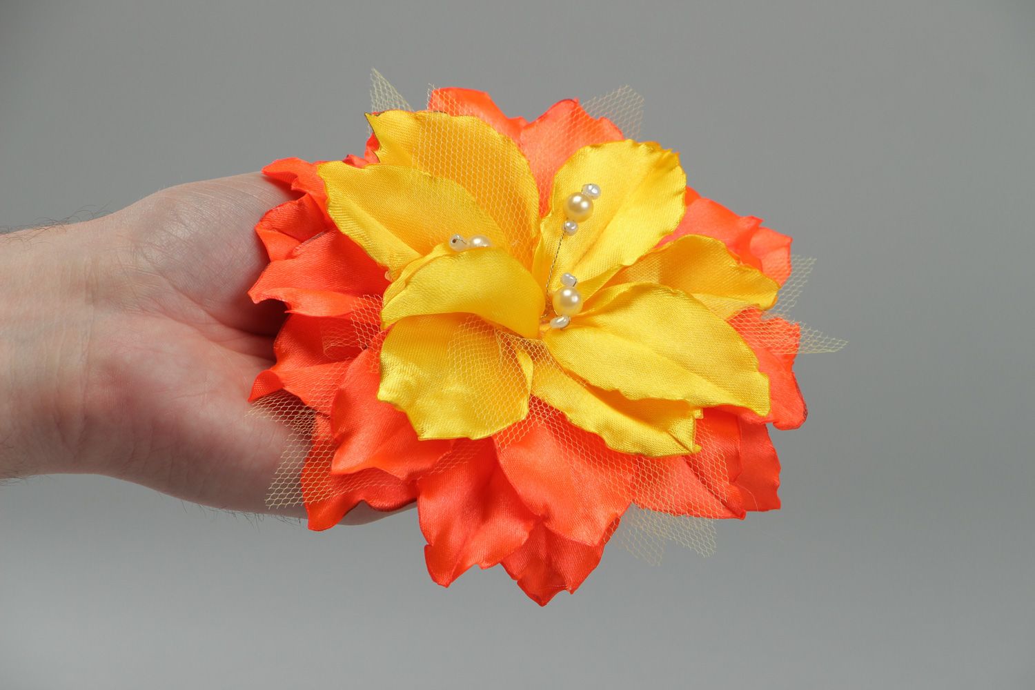 Handmade hair clip with volume yellow and orange lily flower made of satin fabric photo 4