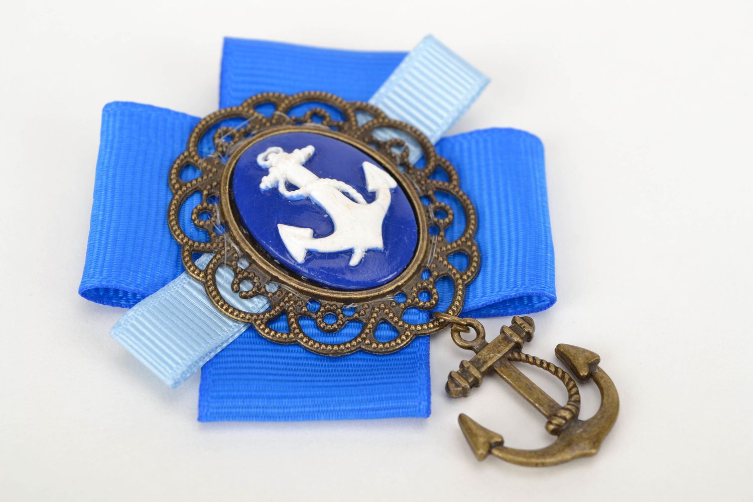 Rep ribbon brooch with charm photo 3