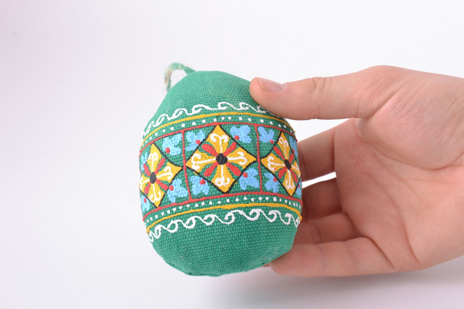 Handmade decorative wall hanging Easter egg sewn of fabric in green colors photo 5