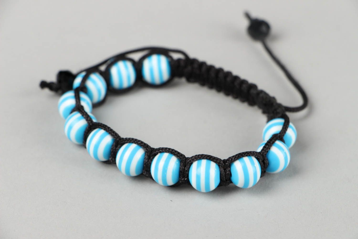 Braided bracelet with beads photo 4