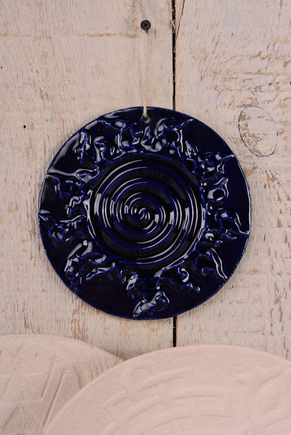 Dekorativer Wandteller aus Keramik Spirale foto 2