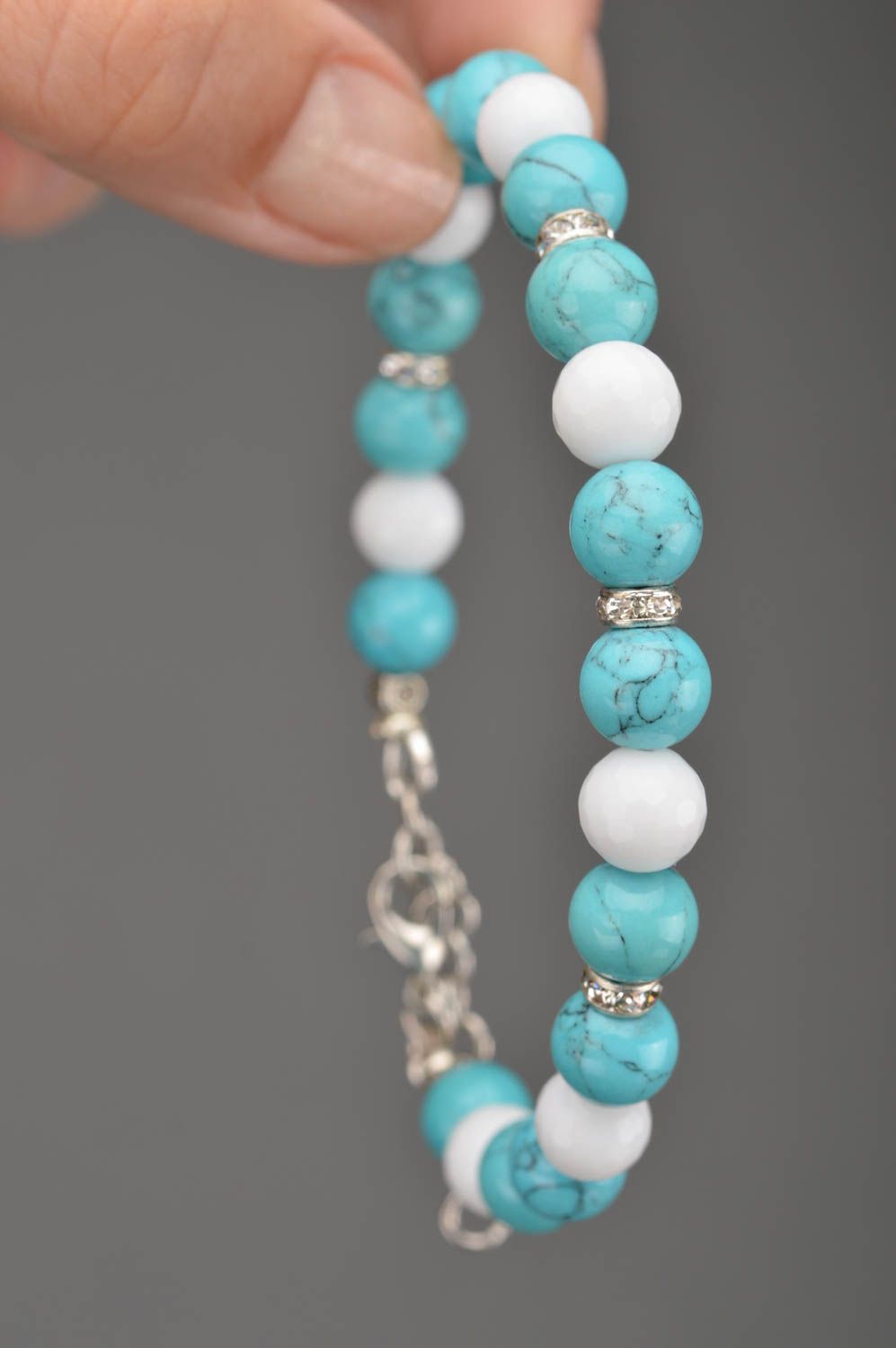 Women's handmade designer woven wrist bracelet with white and turquoise beads photo 2