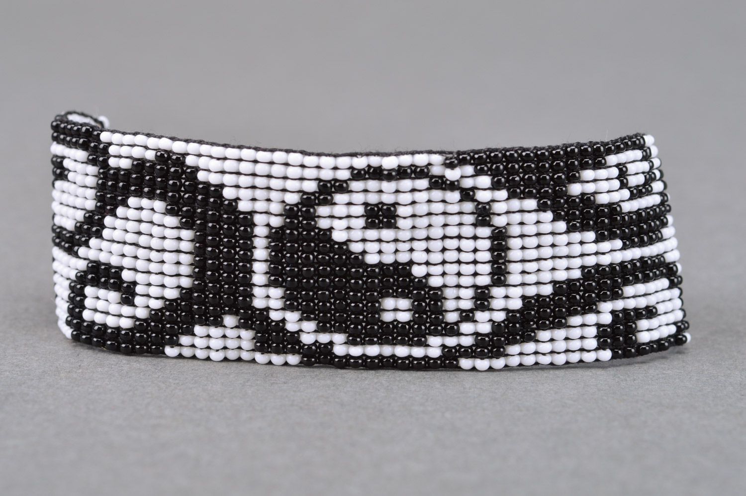 Handmade beaded wide bracelet with ties and black and white pattern photo 2