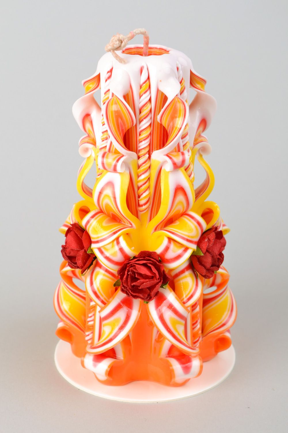 Handgemachte vielfarbige große Kerze aus Paraffin mit Rosen für Haus Dekoration  foto 1