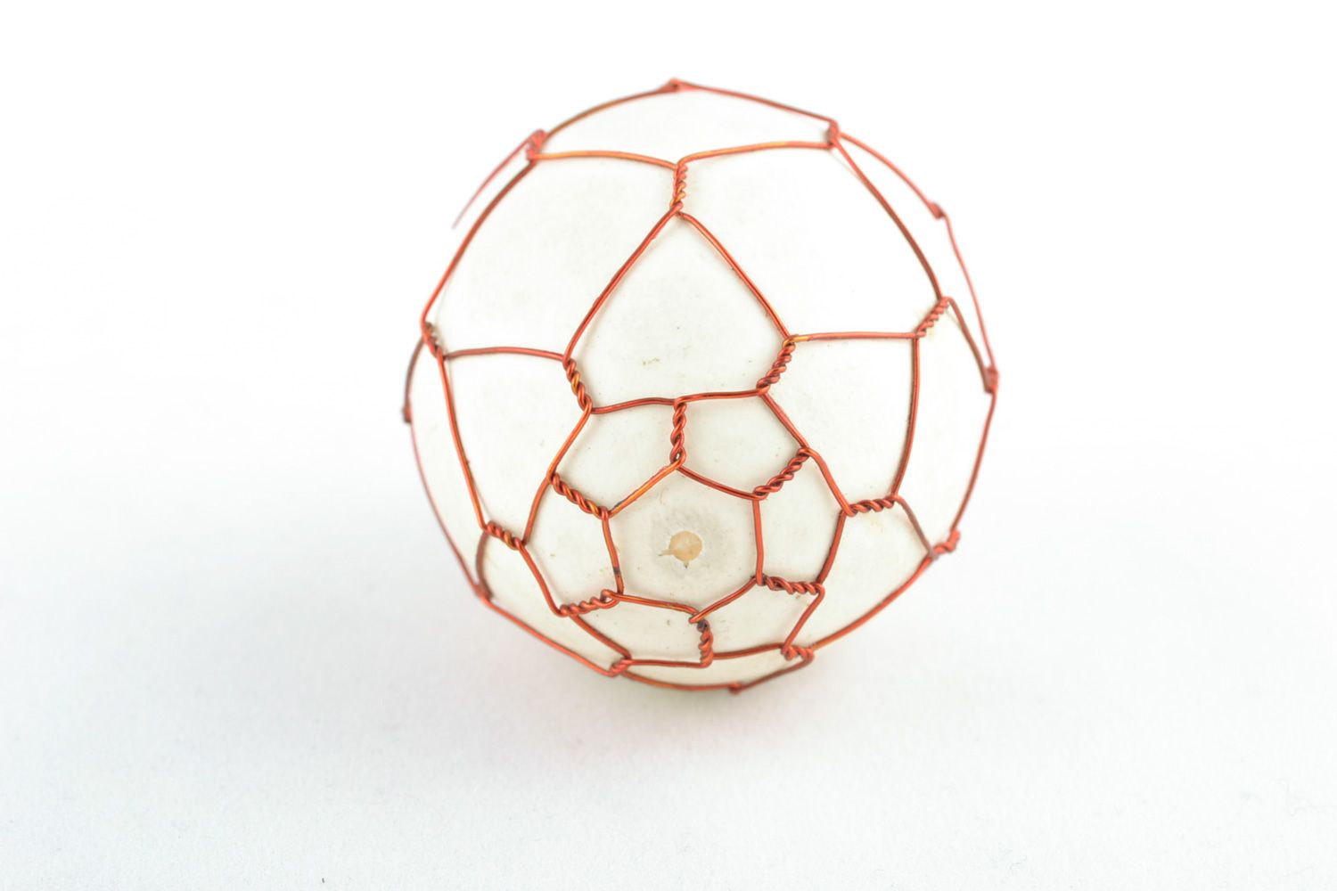 Handmade decorative Easter egg woven over with copper wire for interior decor photo 3