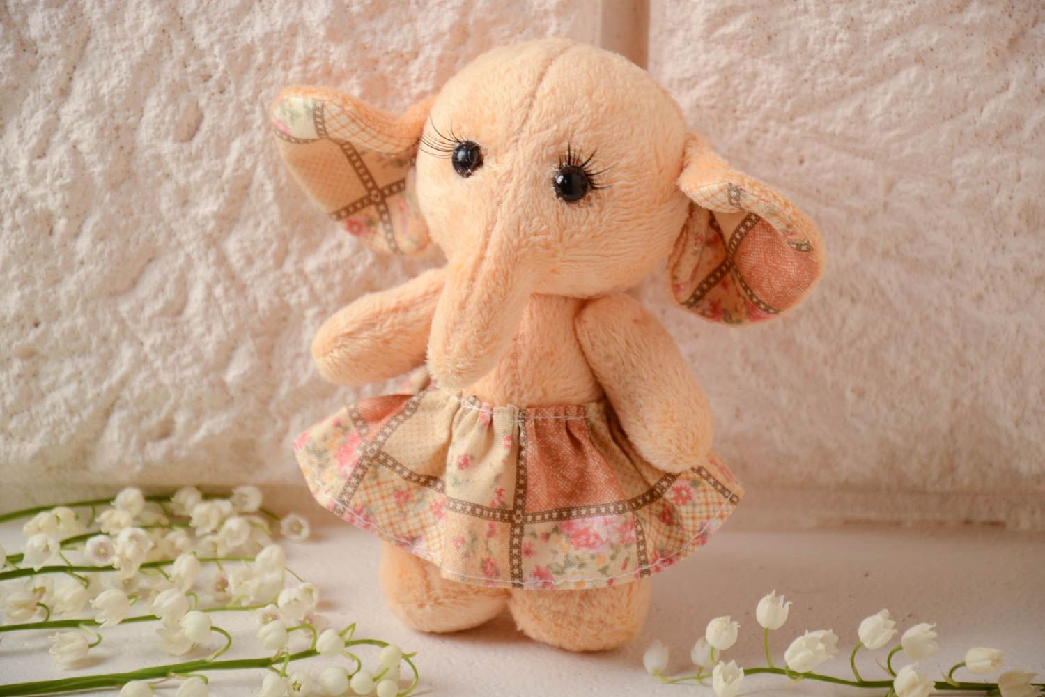 Handmade small plush soft toy elephant girl of peach color in skirt photo 1