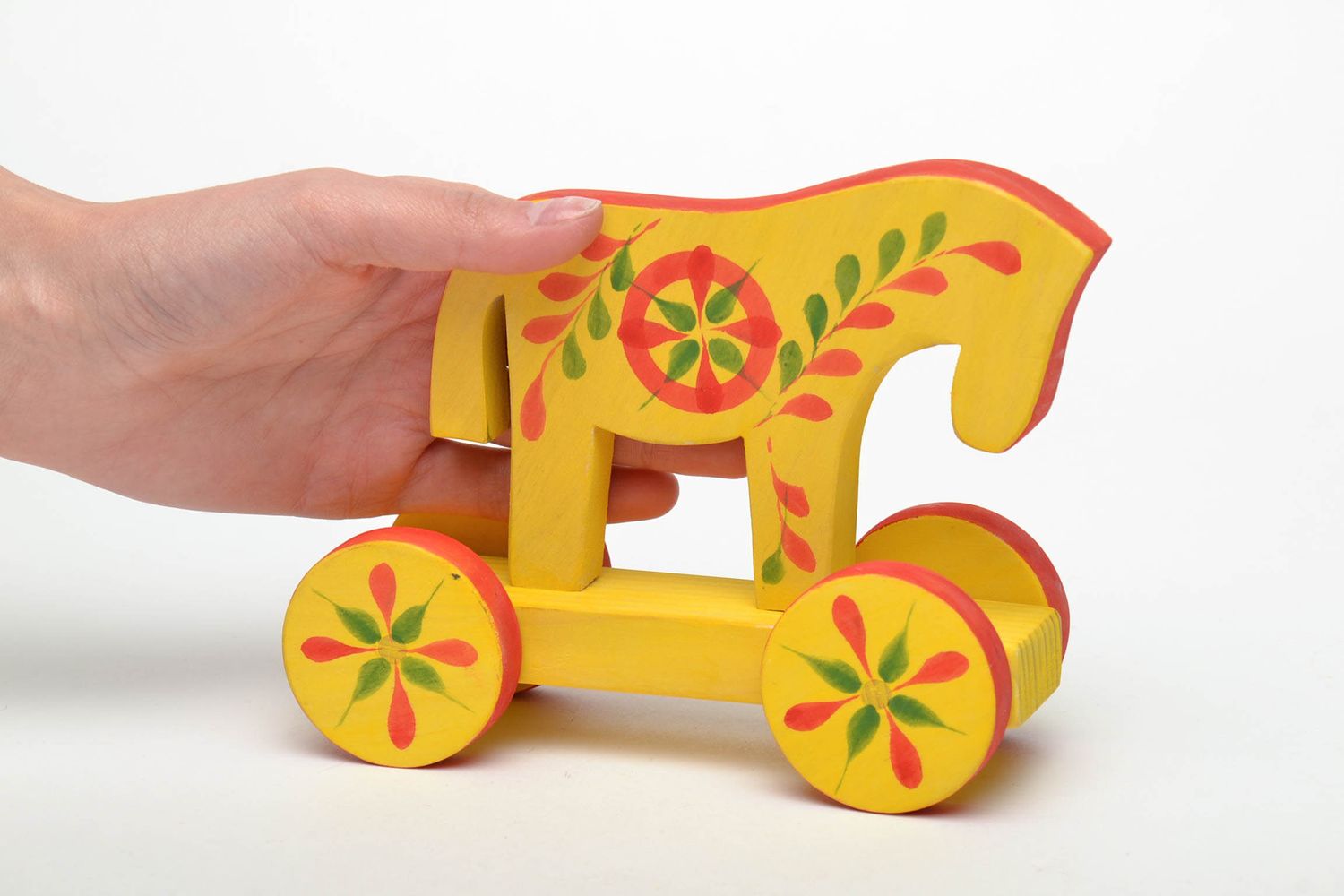 Wooden toy with wheels with ethnic painting Horse photo 5