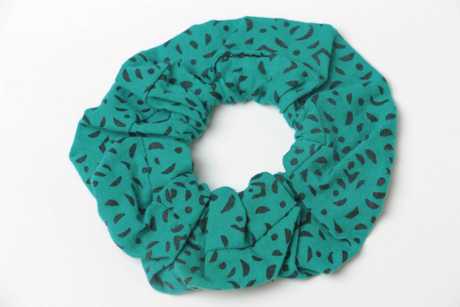 Handmade decorative fabric elastic band of turquoise color with black spots photo 2