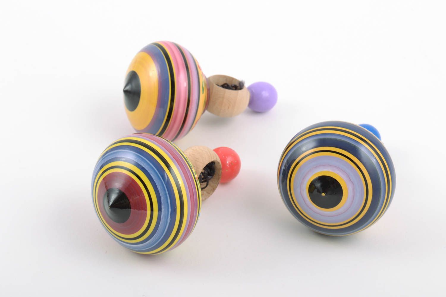 Handmade painted wooden toys set 3 pieces spinning tops with rings and strings photo 4