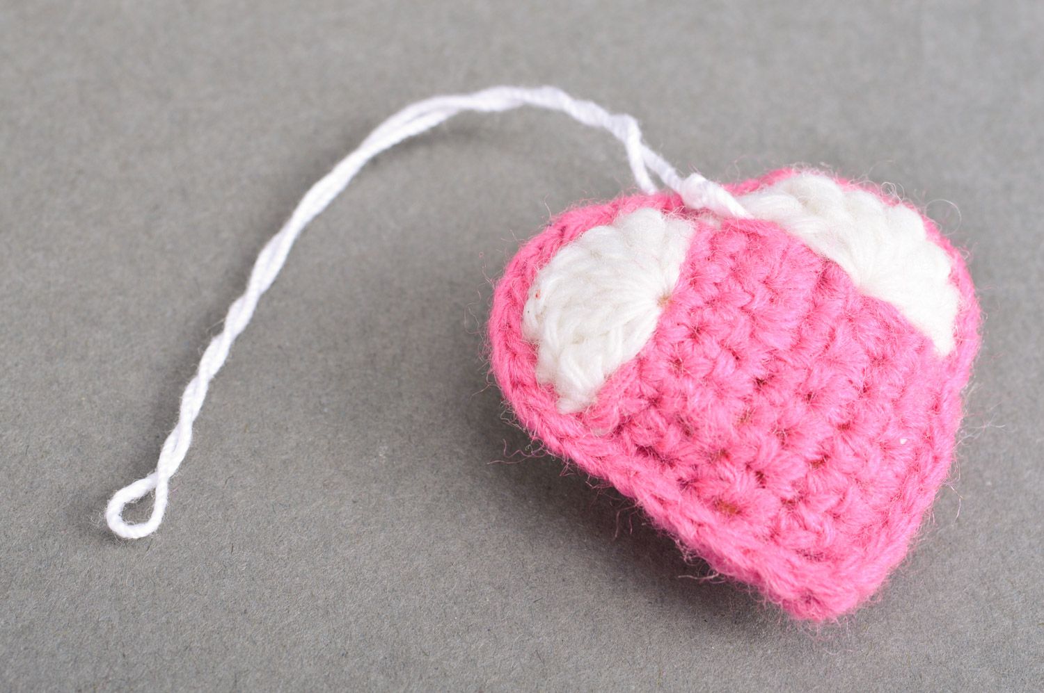 Handmade heart-shaped keychain crocheted of pink and white semi-woolen threads photo 2