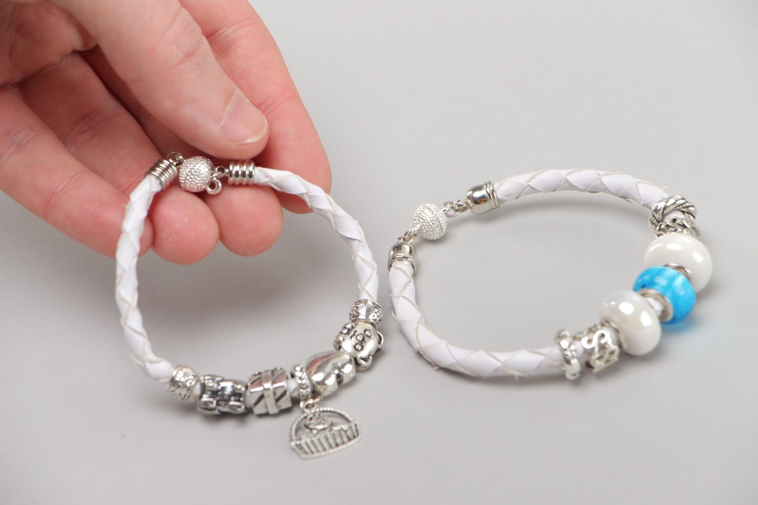Set of 2 handmade white faux leather wrist bracelets with beads and charms photo 5