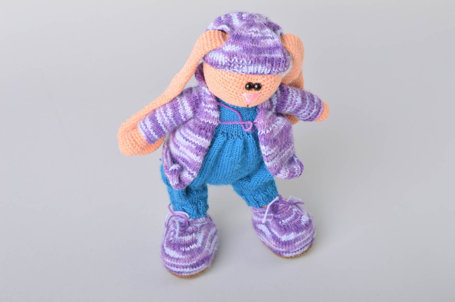 Handmade crocheted soft toy rabbit in blue knit clothing for children photo 3