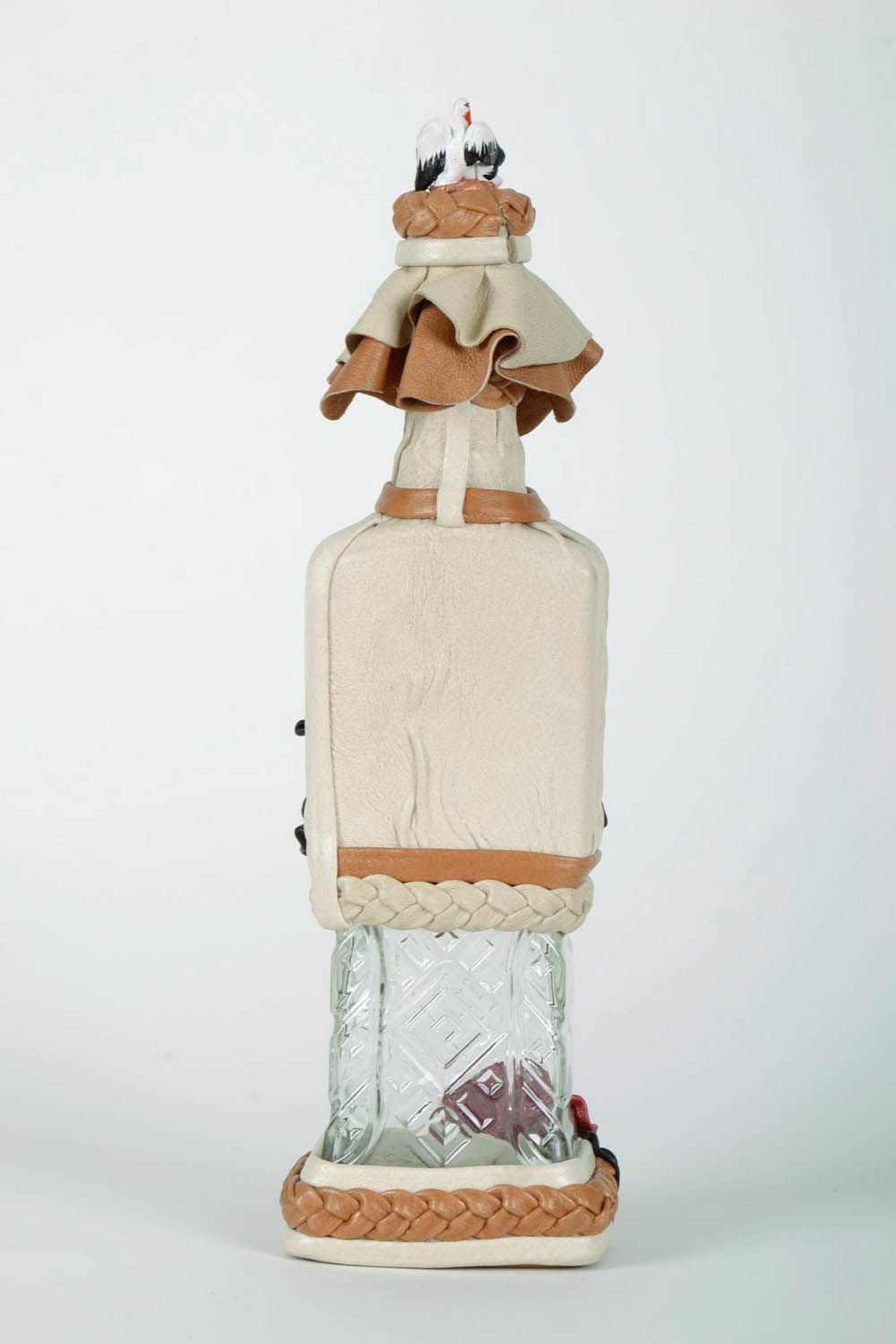 Decorative bottle wrapped with leather photo 4