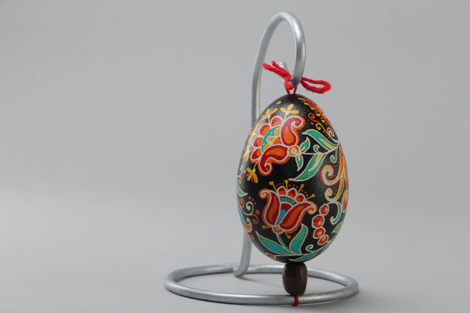 Handmade decorative Easter egg painted with wax and food dyes with metal stand photo 4