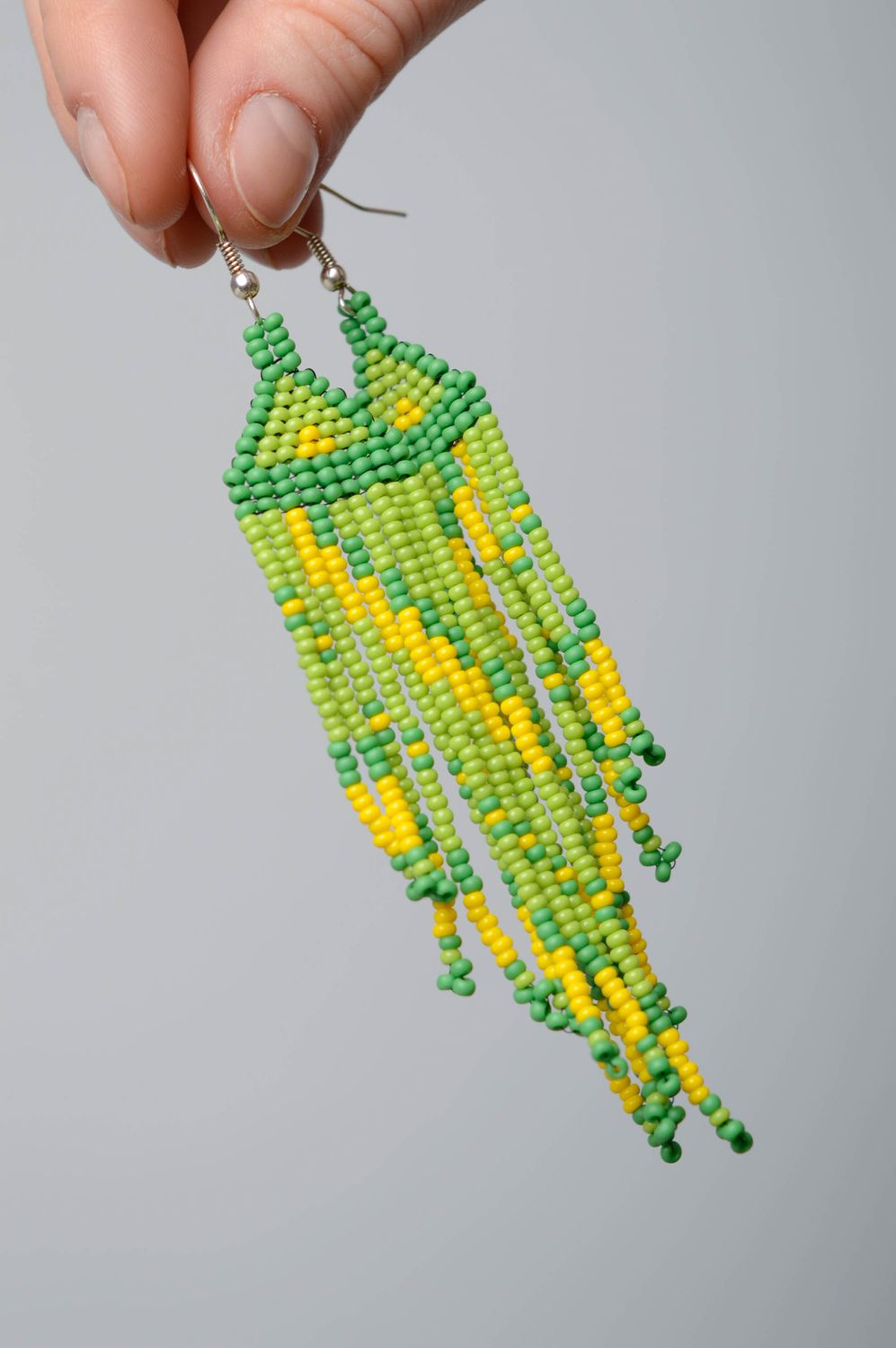 Lange grüne Ohrringe mit Glasperlen foto 4