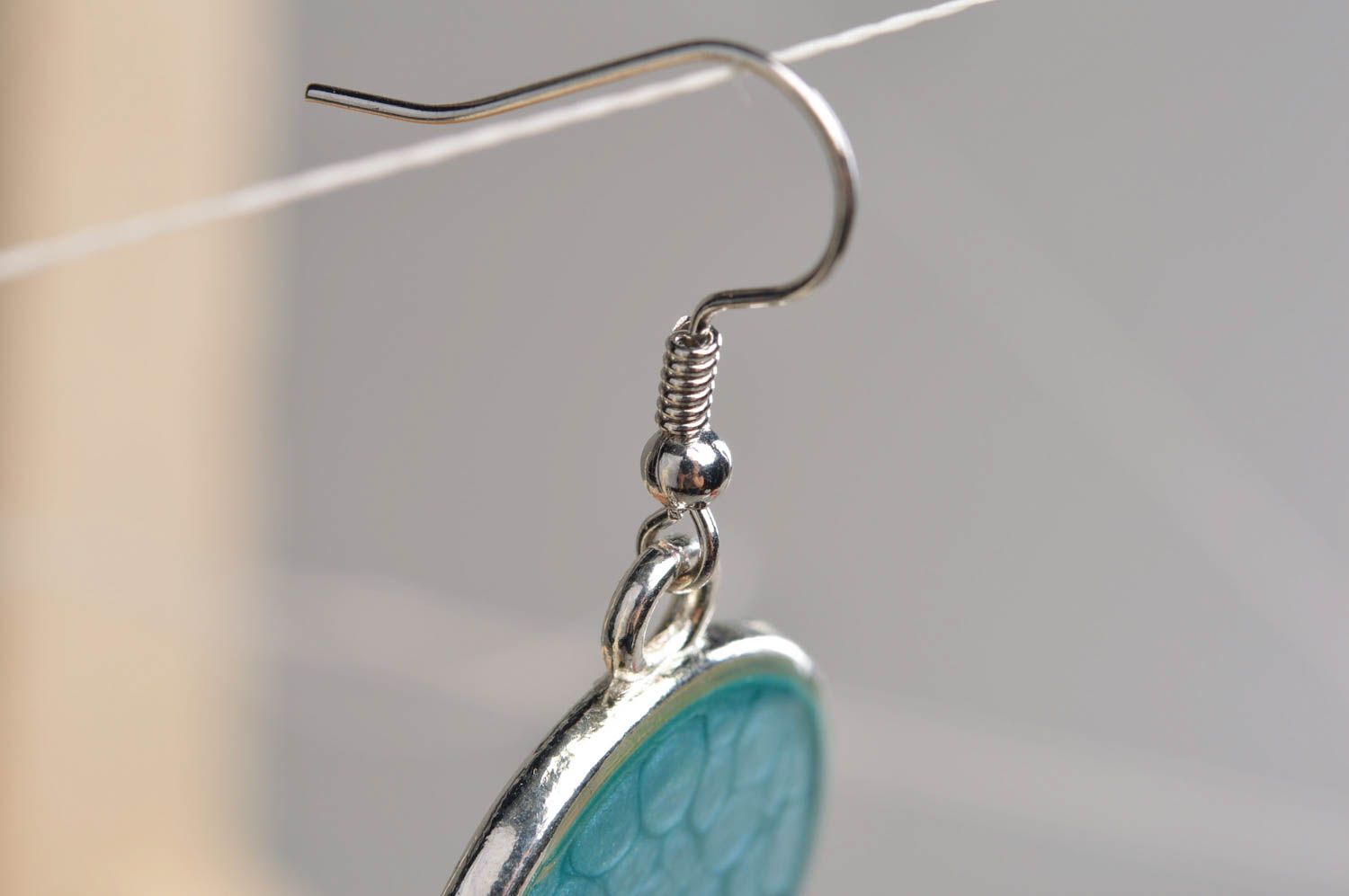 Blue handmade decoupage earrings with jewelry resin and bead photo 1