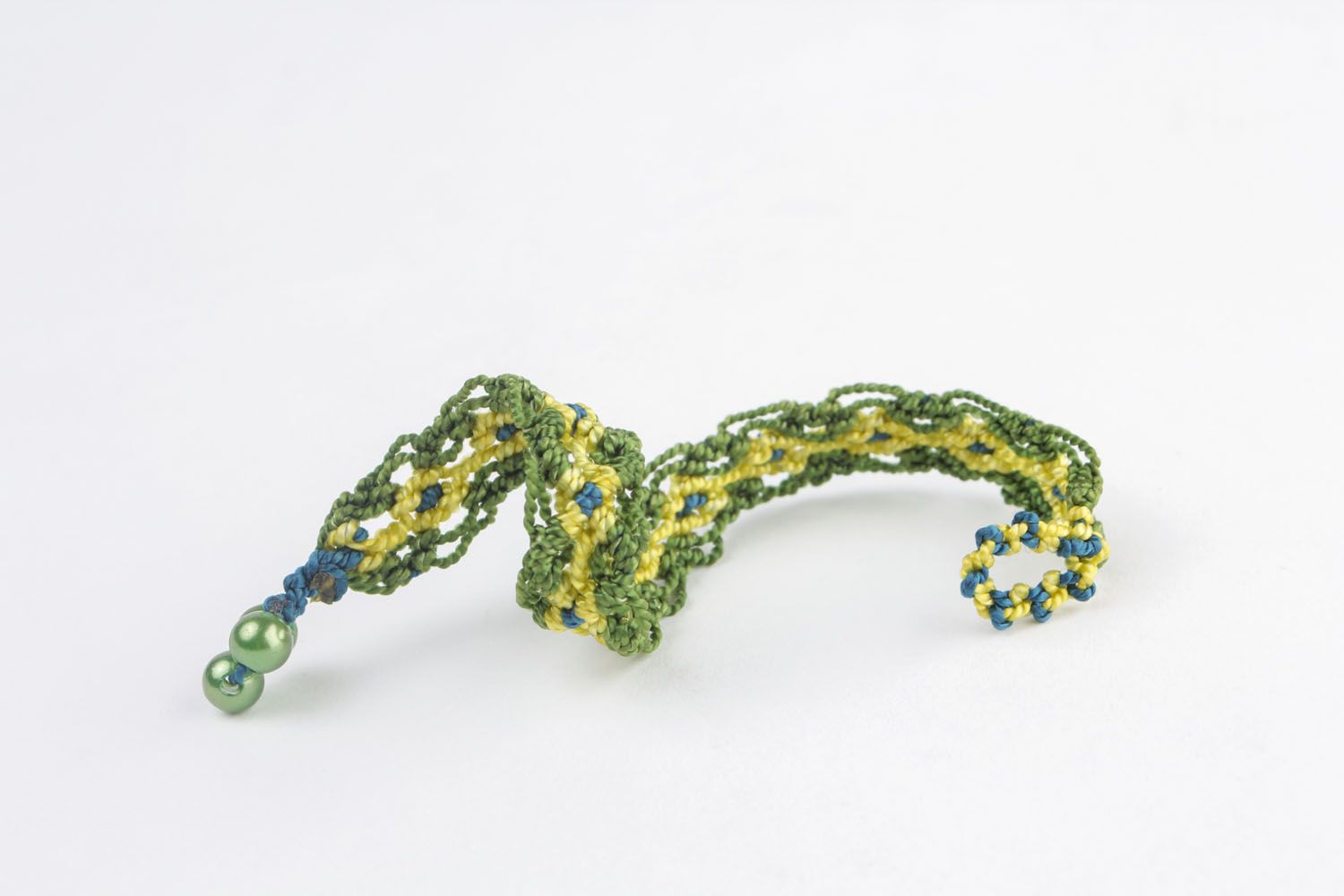 Зеленый плетеный браслет фото 4