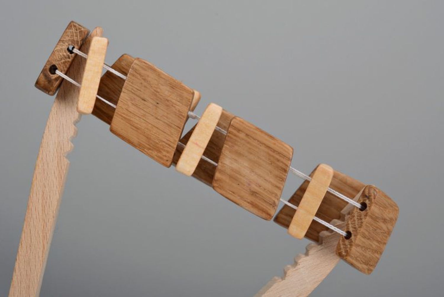 Brown wooden bracelet on elastic band photo 3