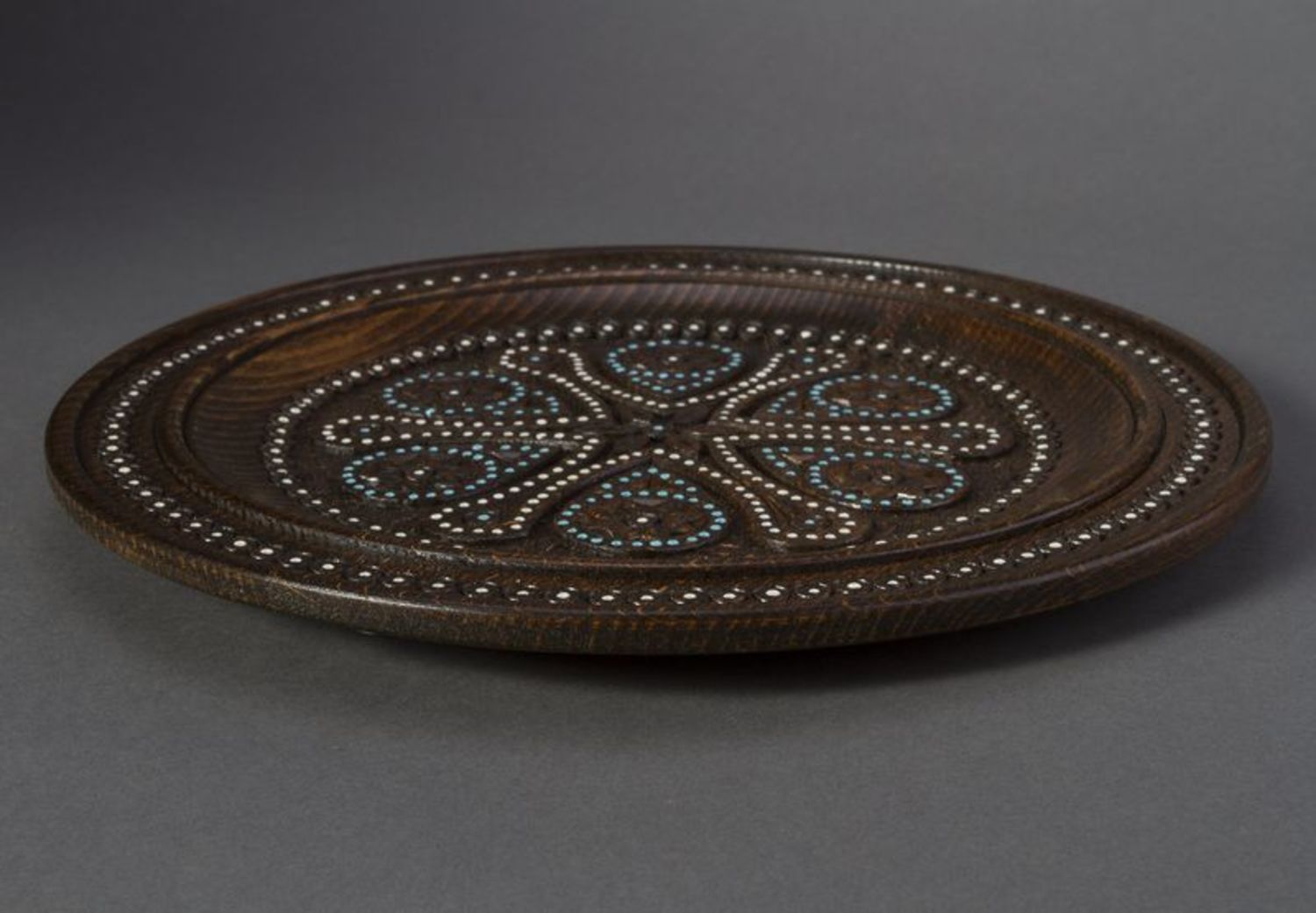 Wooden plate inlaid with beads photo 4